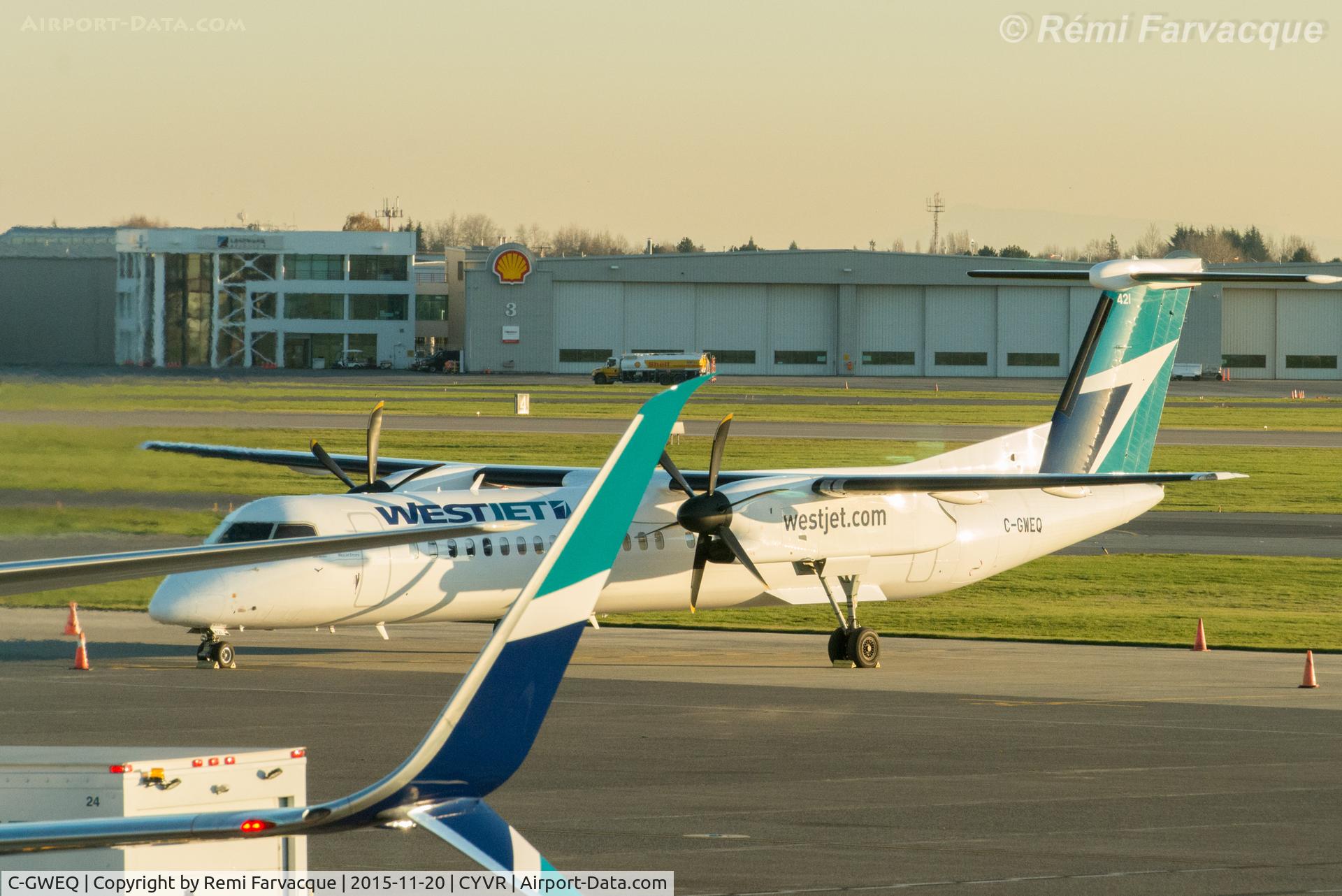 C-GWEQ, 2015 Bombardier DHC-8-402 Dash 8 C/N 4490, Parked on tarmac near domestic terminal.