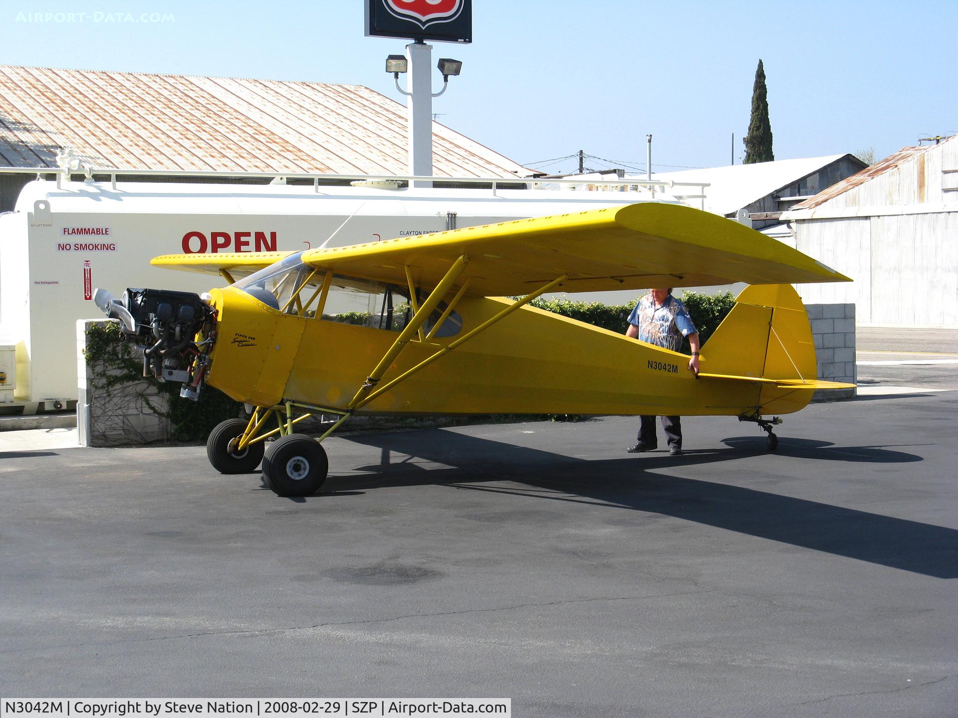 N3042M, 1947 Piper PA-12 Super Cruiser C/N 12-1734, Wyoming Services LLC (Cheyenne, WY) banner towing 1947 Piper PA-12 with cowling removed @ Santa Paula Municipal Airport