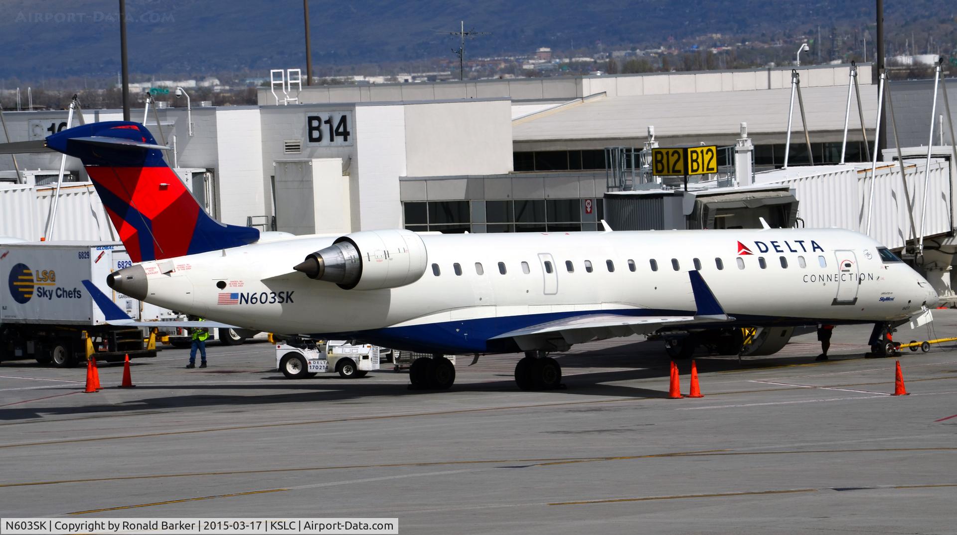 N603SK, 2006 Bombardier CRJ-702 (CL-600-2C10) Regional Jet C/N 10248, At the gate SLC