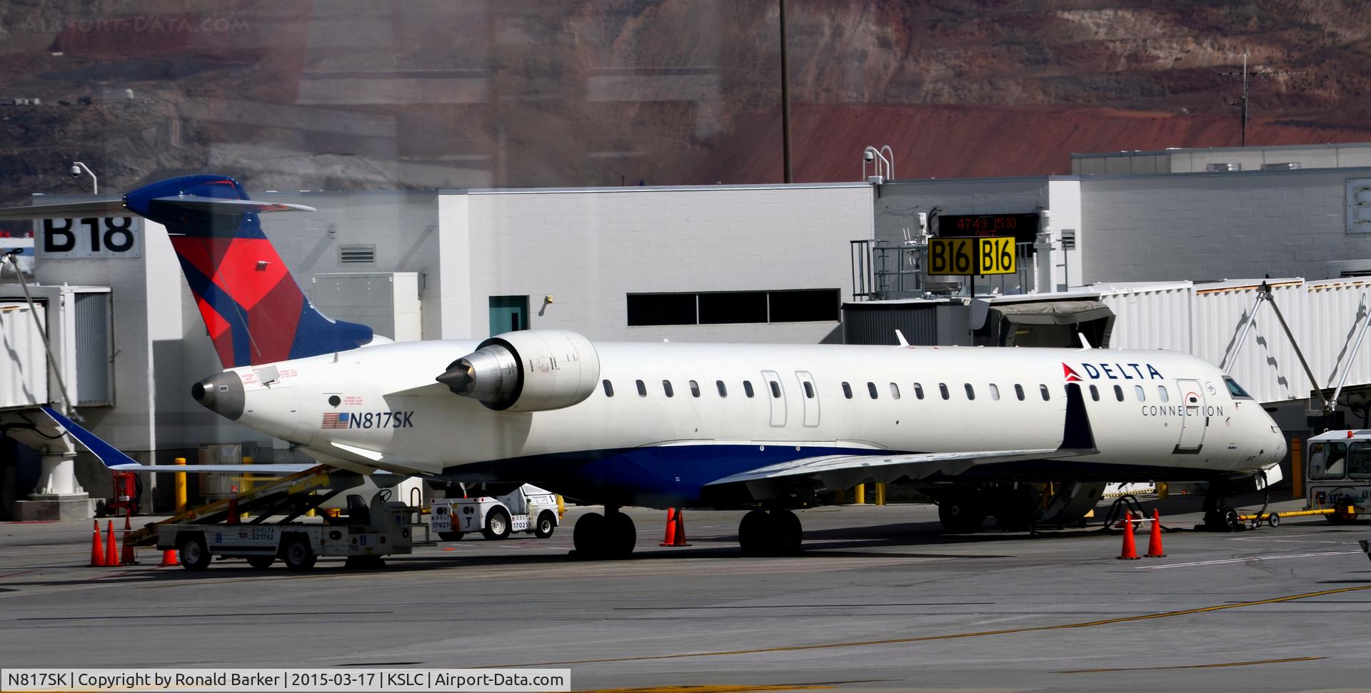 N817SK, 2006 Bombardier CRJ-900ER (CL-600-2D24) C/N 15107, Gate B16 SLC