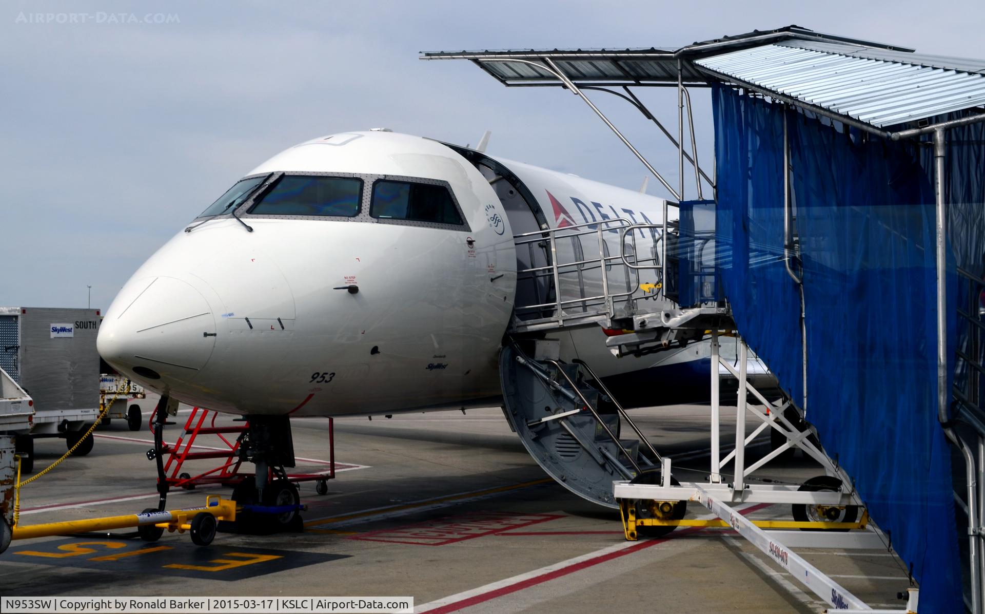 N953SW, 2003 Bombardier CRJ-200LR (CL-600-2B19) C/N 7813, At the gate SLC