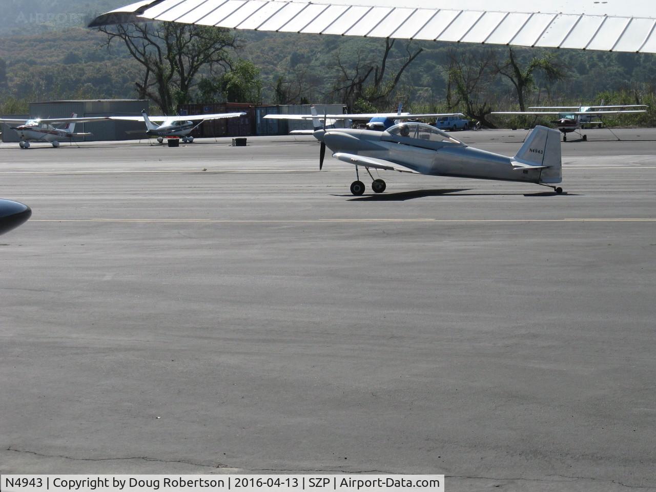 N4943, 2014 Vans RV-4 C/N 4311, 2014 Corson VAN's RV-4, Lycoming O-320-D2B 160 hp, another taxi to Rwy 22, excuse my grab shot