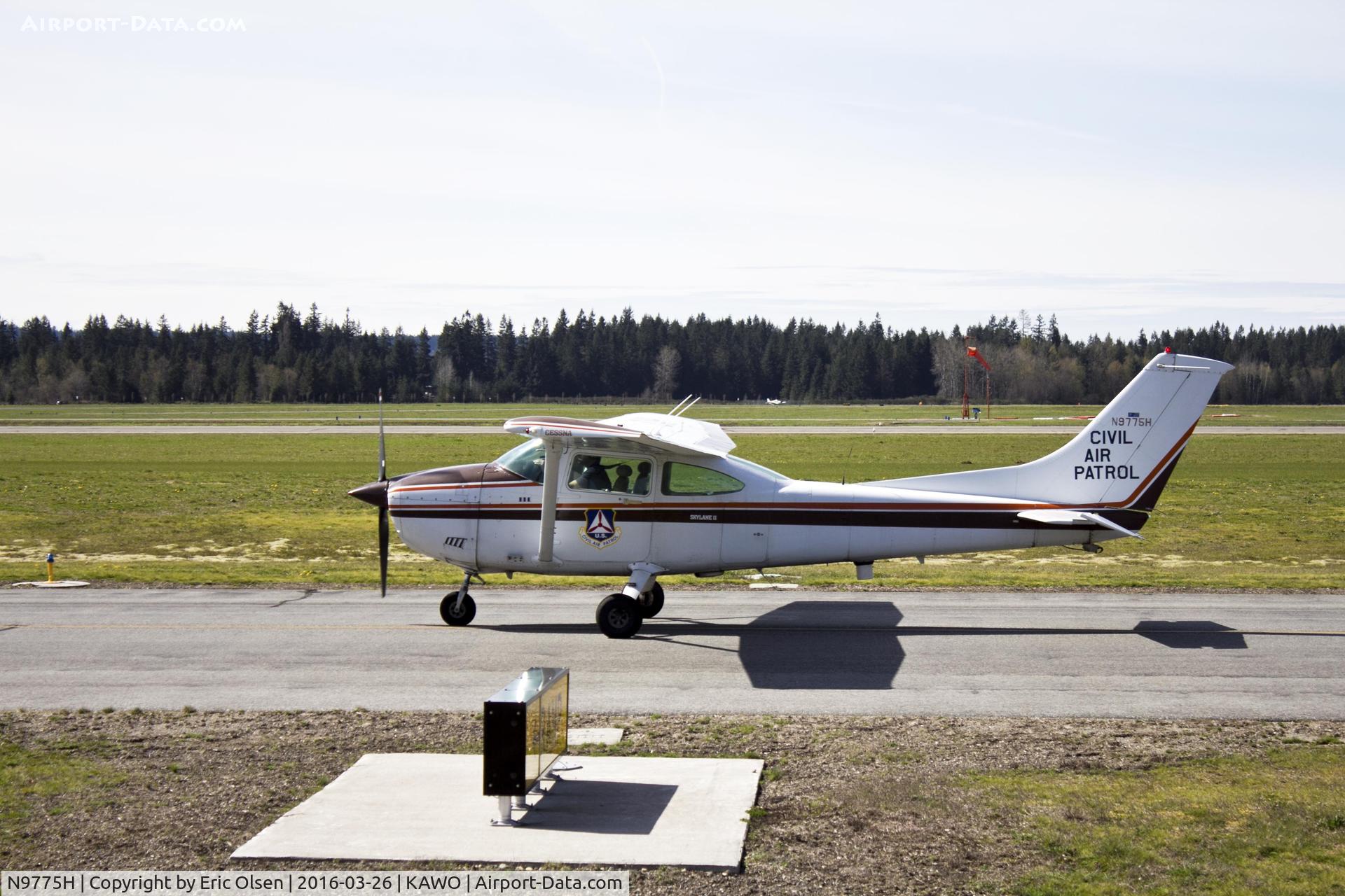 N9775H, 1981 Cessna 182R Skylane C/N 18268014, Civil Air Patrol taxing by Ellie's at the Airport.