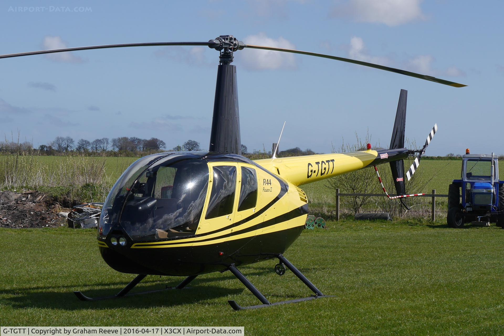 G-TGTT, 2002 Robinson R44 Raven II C/N 10023, Parked at Northrepps.