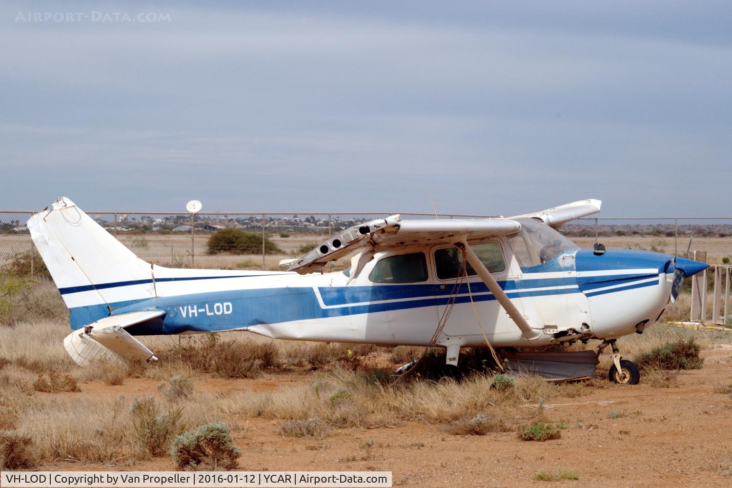 VH-LOD, 1975 Cessna 172M C/N 17266108, Cessna 172M at Carnarvon airport Western Australia. It sustained this damage when it was thrown on a fence next to the Shine Aviation hangar at YCAR during cyclone Olwyn, 14-03-2015.