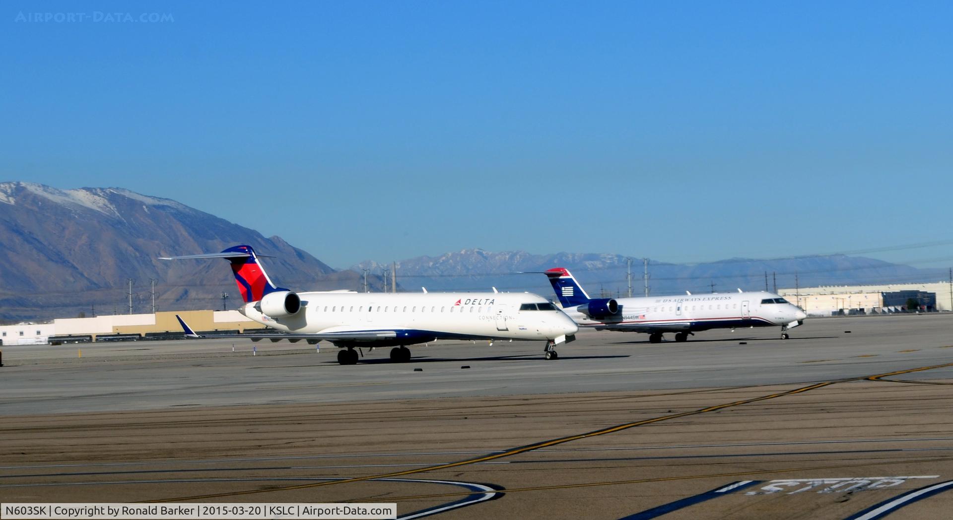 N603SK, 2006 Bombardier CRJ-702 (CL-600-2C10) Regional Jet C/N 10248, At the gate SLC