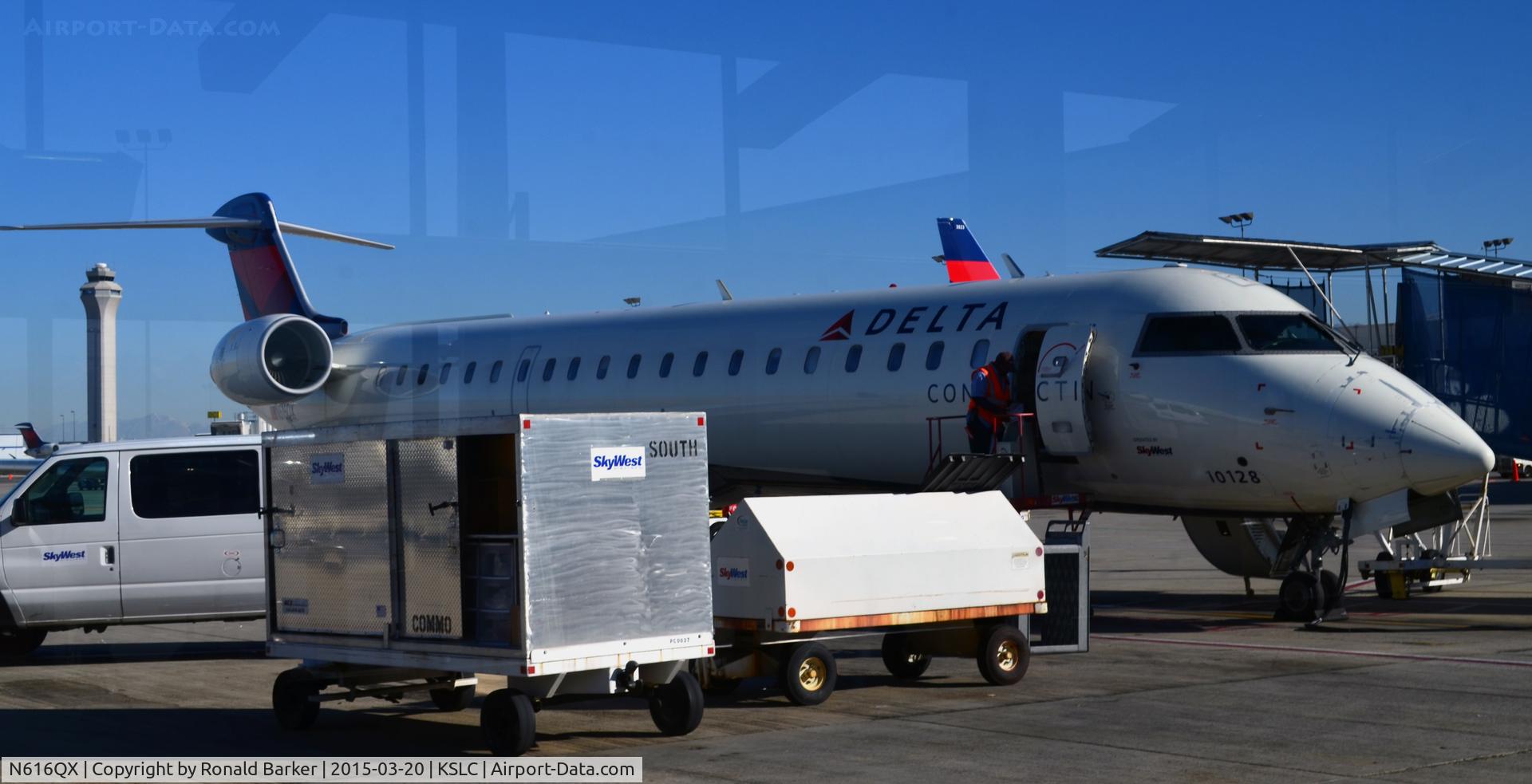 N616QX, 2003 Bombardier CRJ-701 (CL-600-2C10) C/N 10128, At the gate SLC