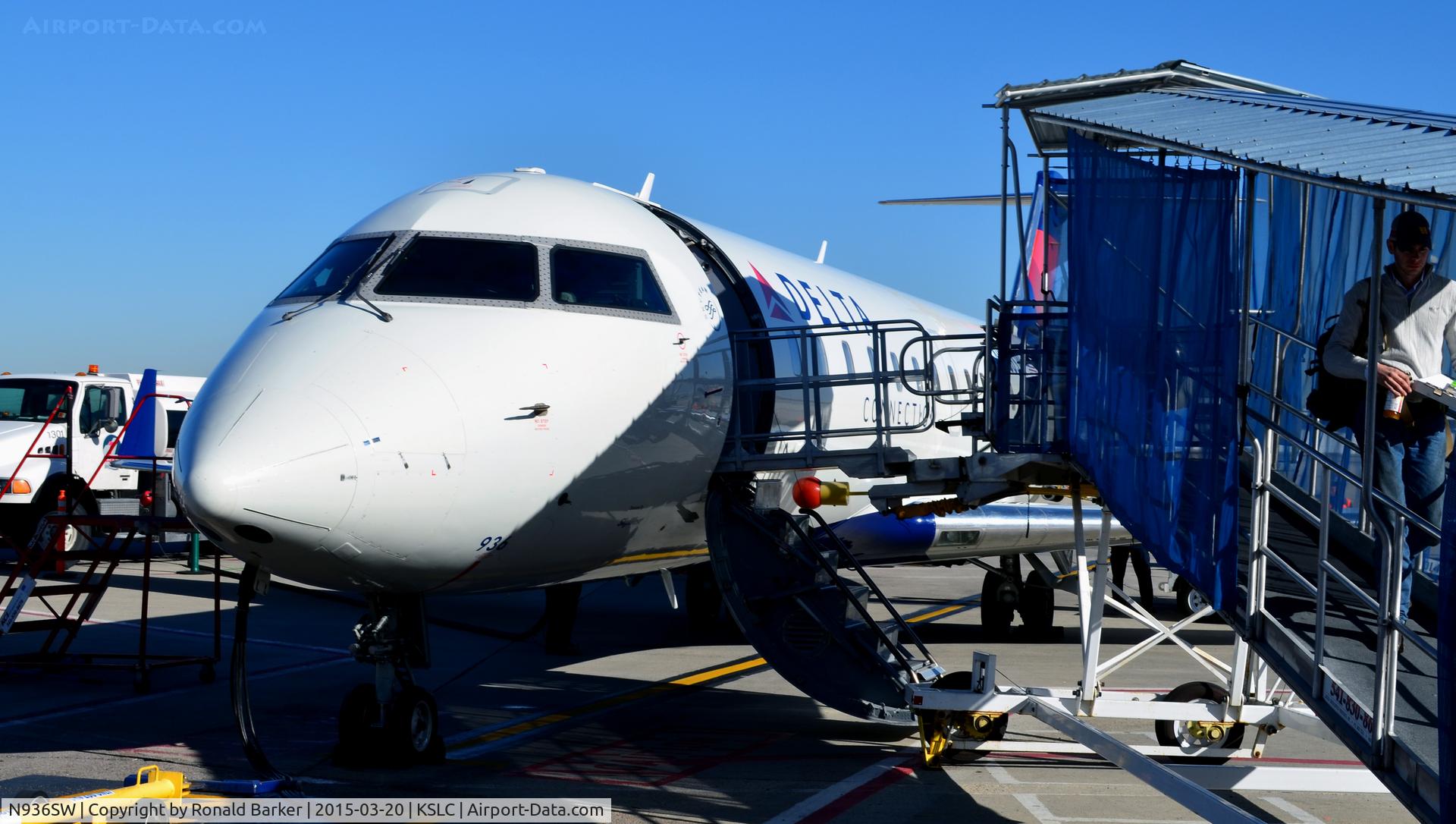 N936SW, 2002 Bombardier CRJ-200LR (CL-600-2B19) C/N 7726, At the gate SLC