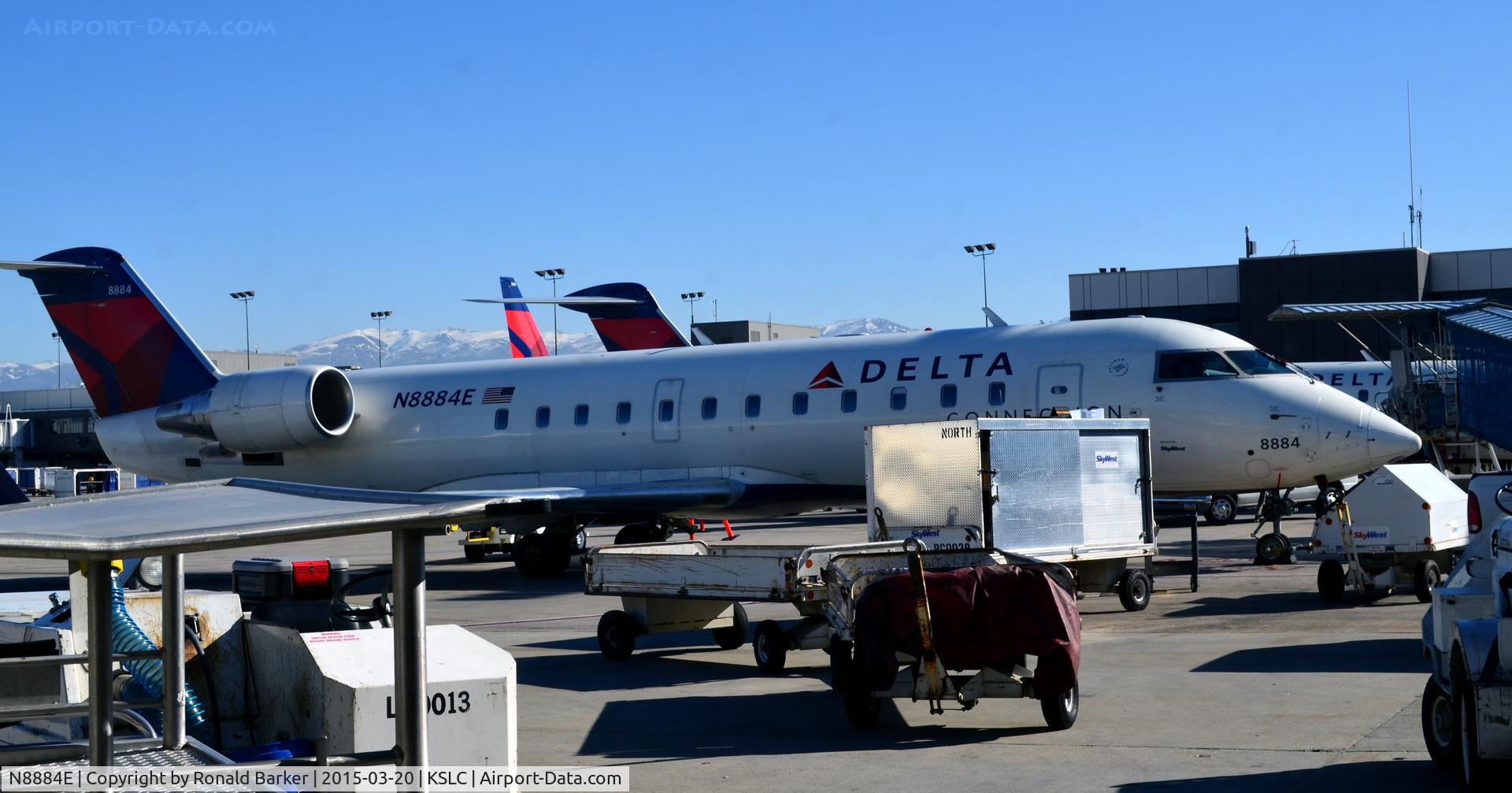 N8884E, 2003 Bombardier CRJ-200 (CL-600-2B19) C/N 7884, At the gate SLC