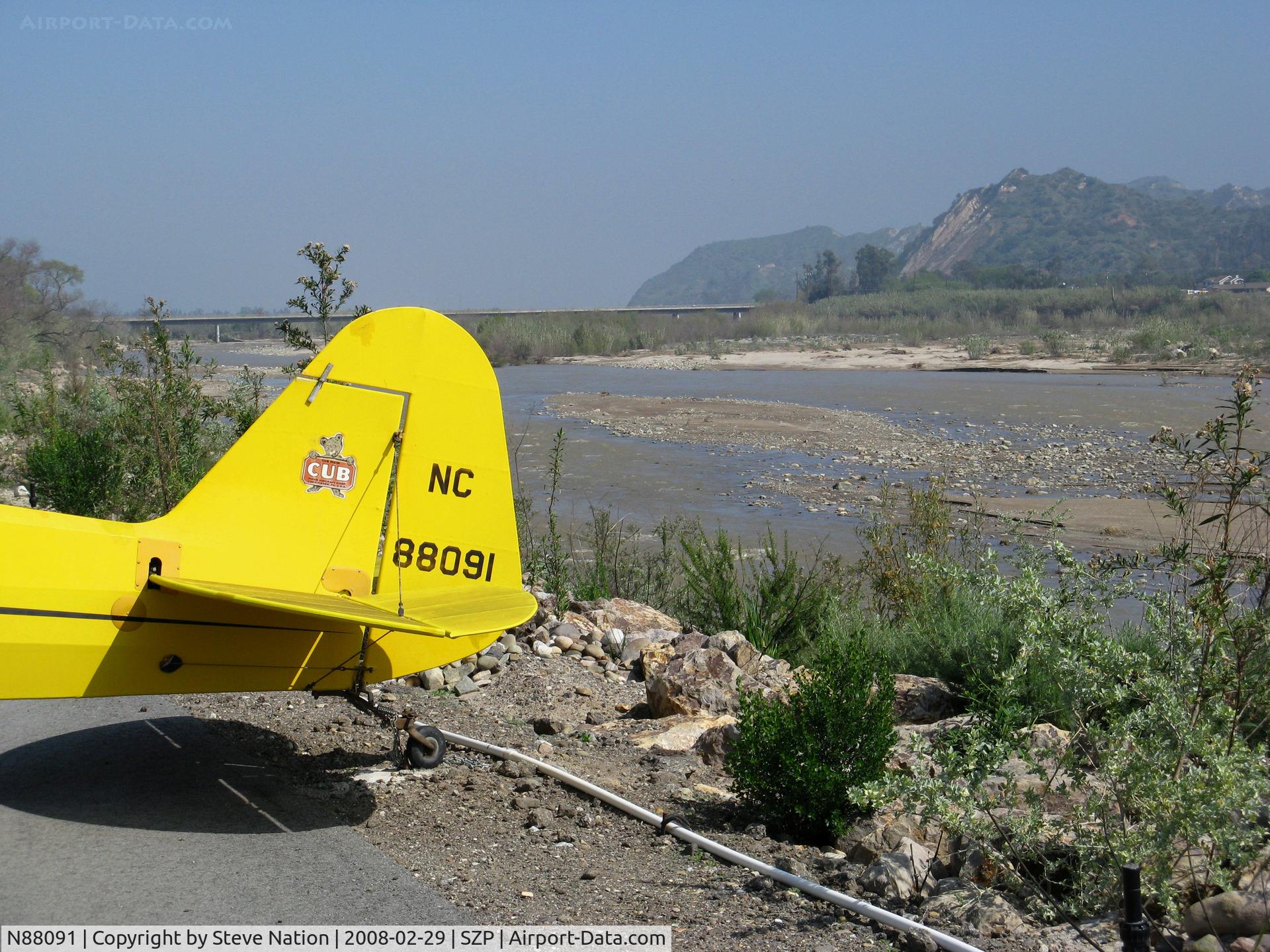 N88091, 1946 Piper J3C-65 Cub Cub C/N 15708, CLOSE-UP TAIL of Locally-based 1946 Piper J3C-65 Cub @ Santa Paula Airport, CA as NC88091 - note Santa Clara River running in background