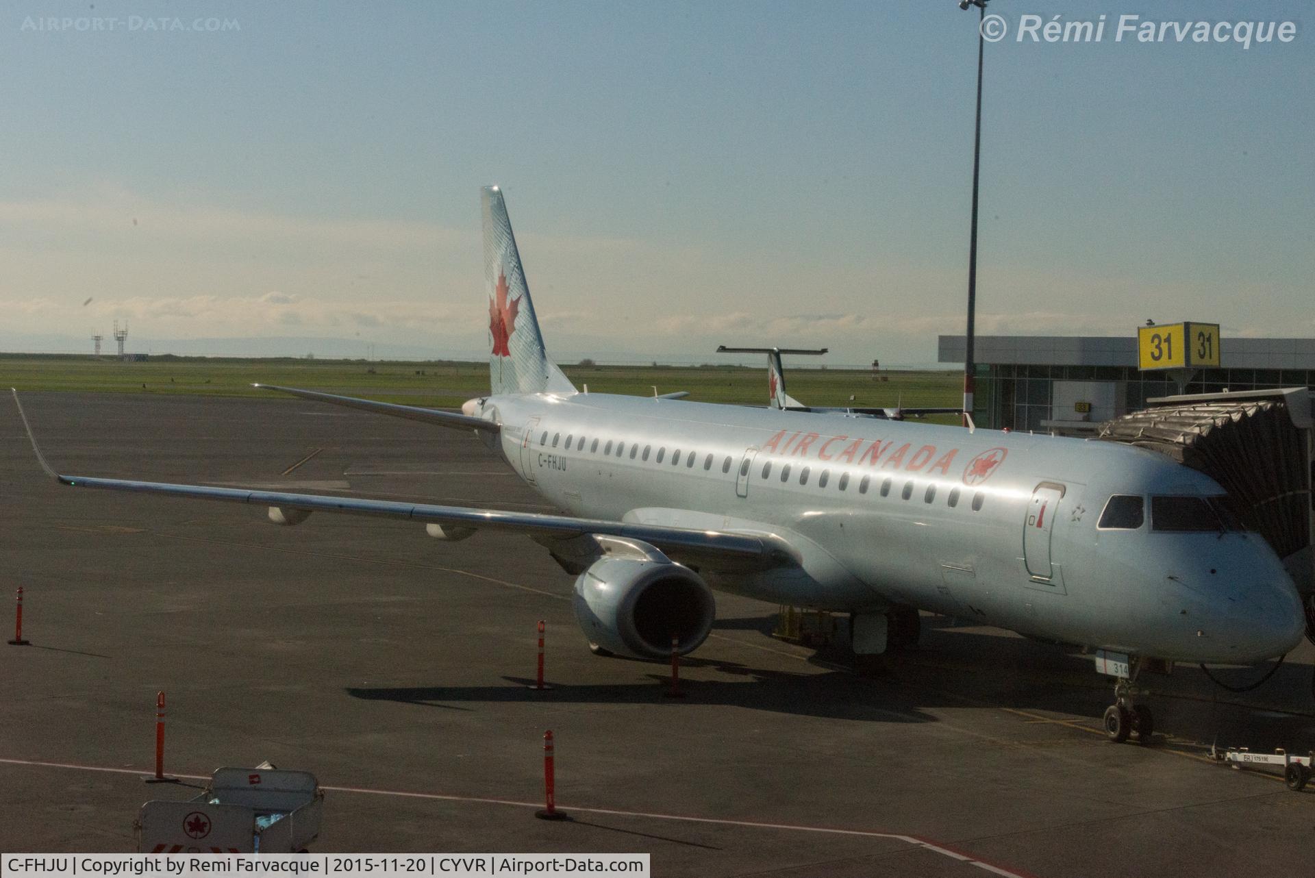 C-FHJU, 2006 Embraer 190AR (ERJ-190-100IGW) C/N 19000044, Waiting to load in domestic terminal.
