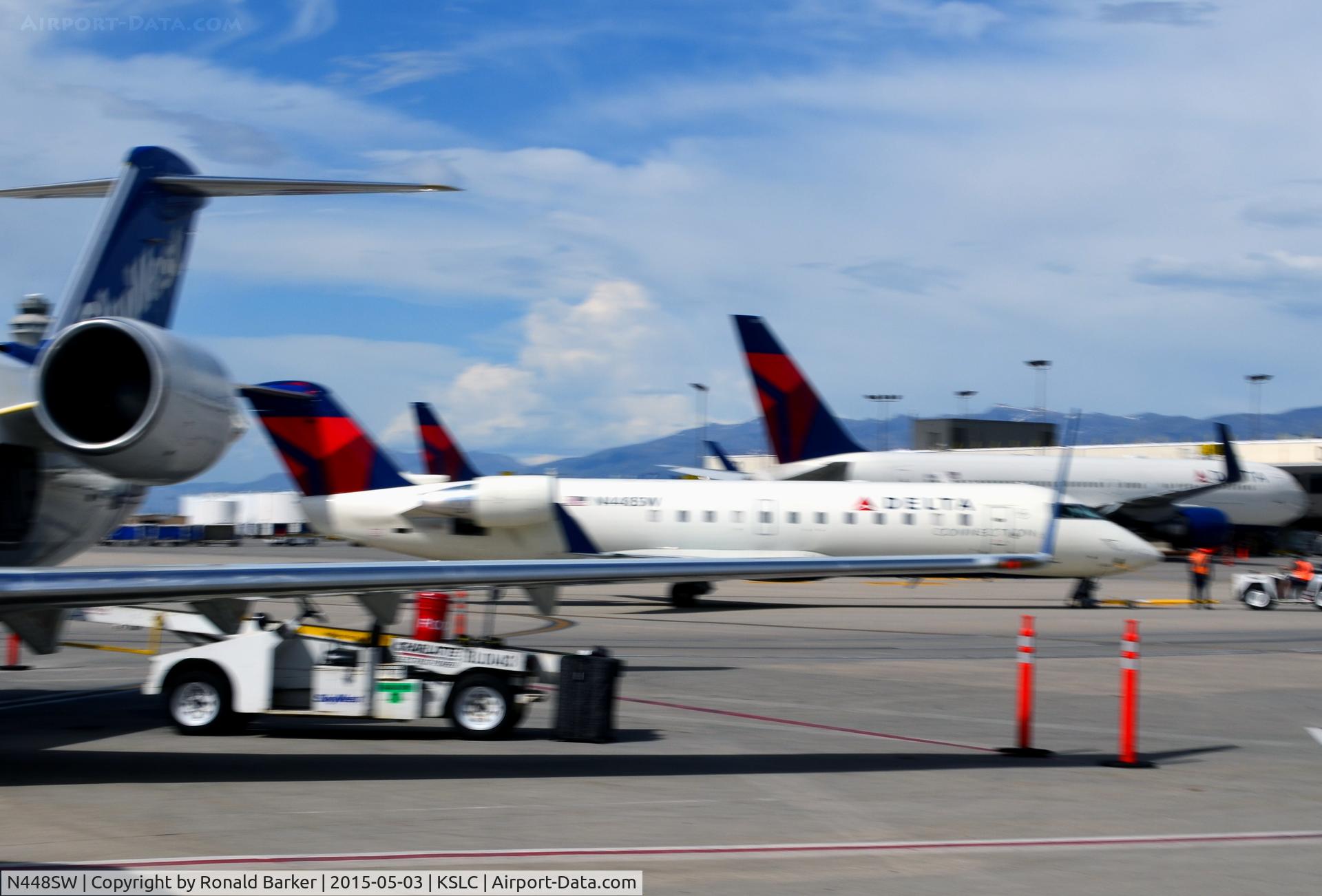 N448SW, 2002 Bombardier CRJ-200LR (CL-600-2B19) C/N 7678, At the gate SLC