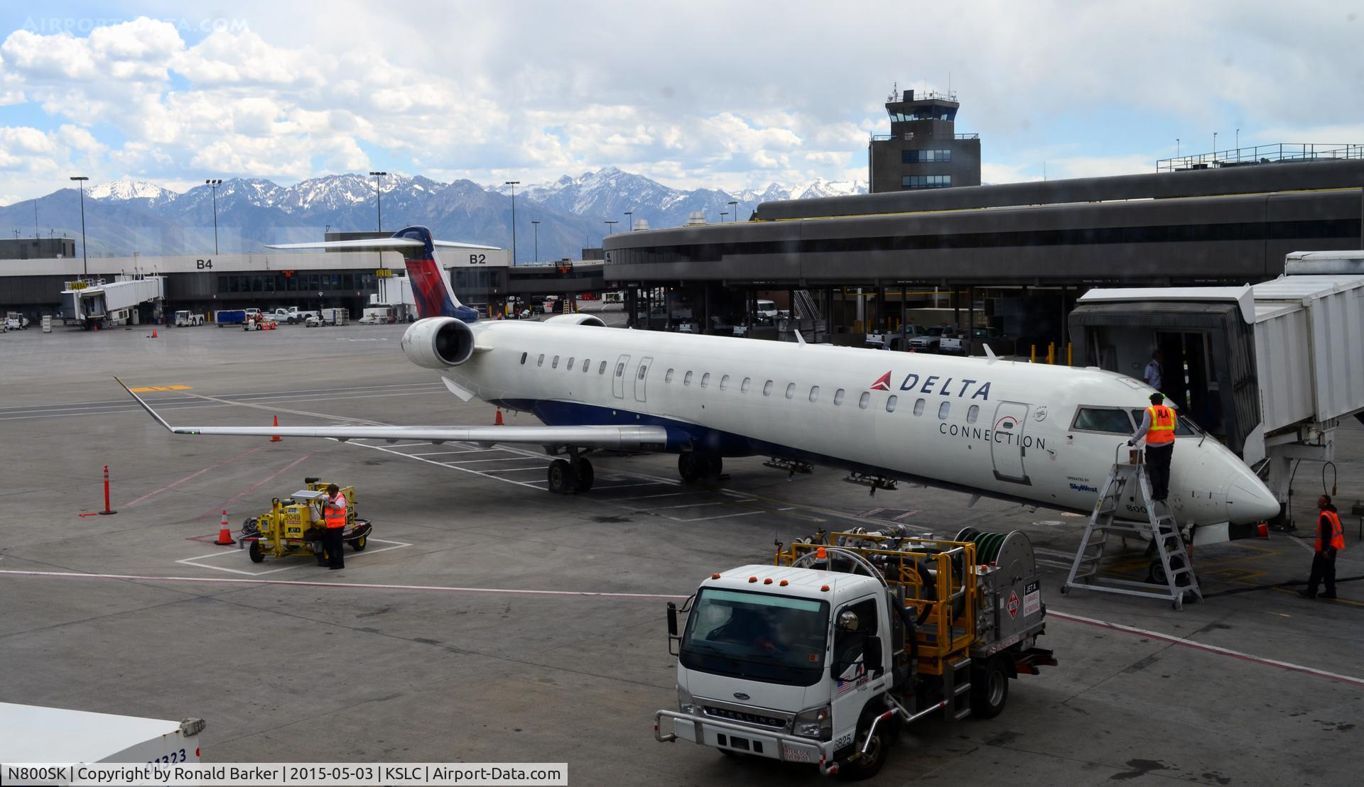 N800SK, 2006 Bombardier CRJ-900ER (CL-600-2D24) C/N 15060, At the gate SLC