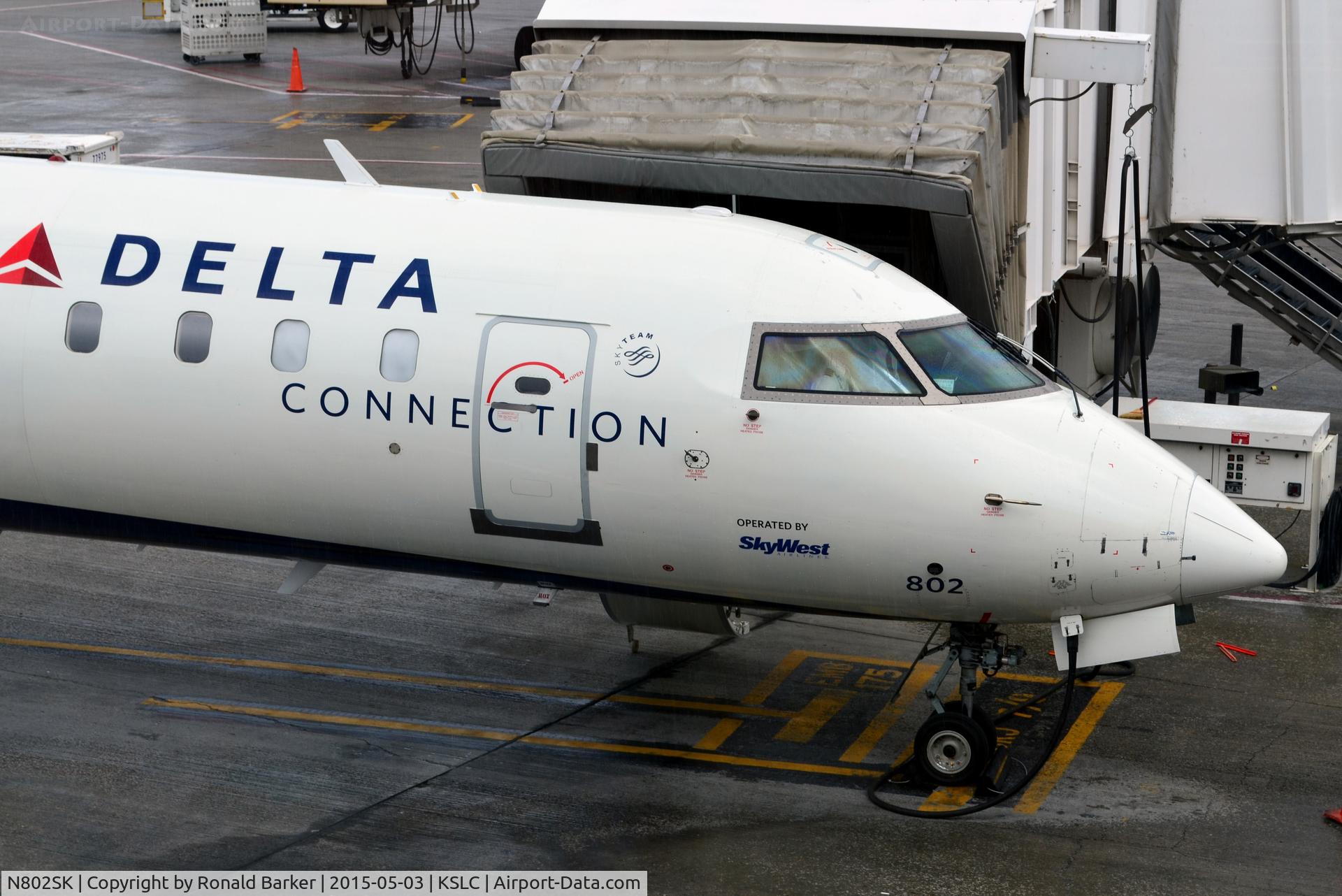N802SK, 2006 Canadair CL-600-2D24 Regional Jet CRJ-900 C/N 15061, At the Gate B2, SLC