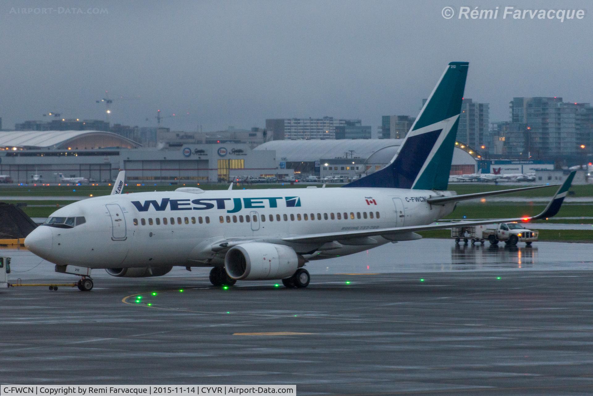 C-FWCN, 2003 Boeing 737-7CT C/N 33698, Push-back from domestic for take-off