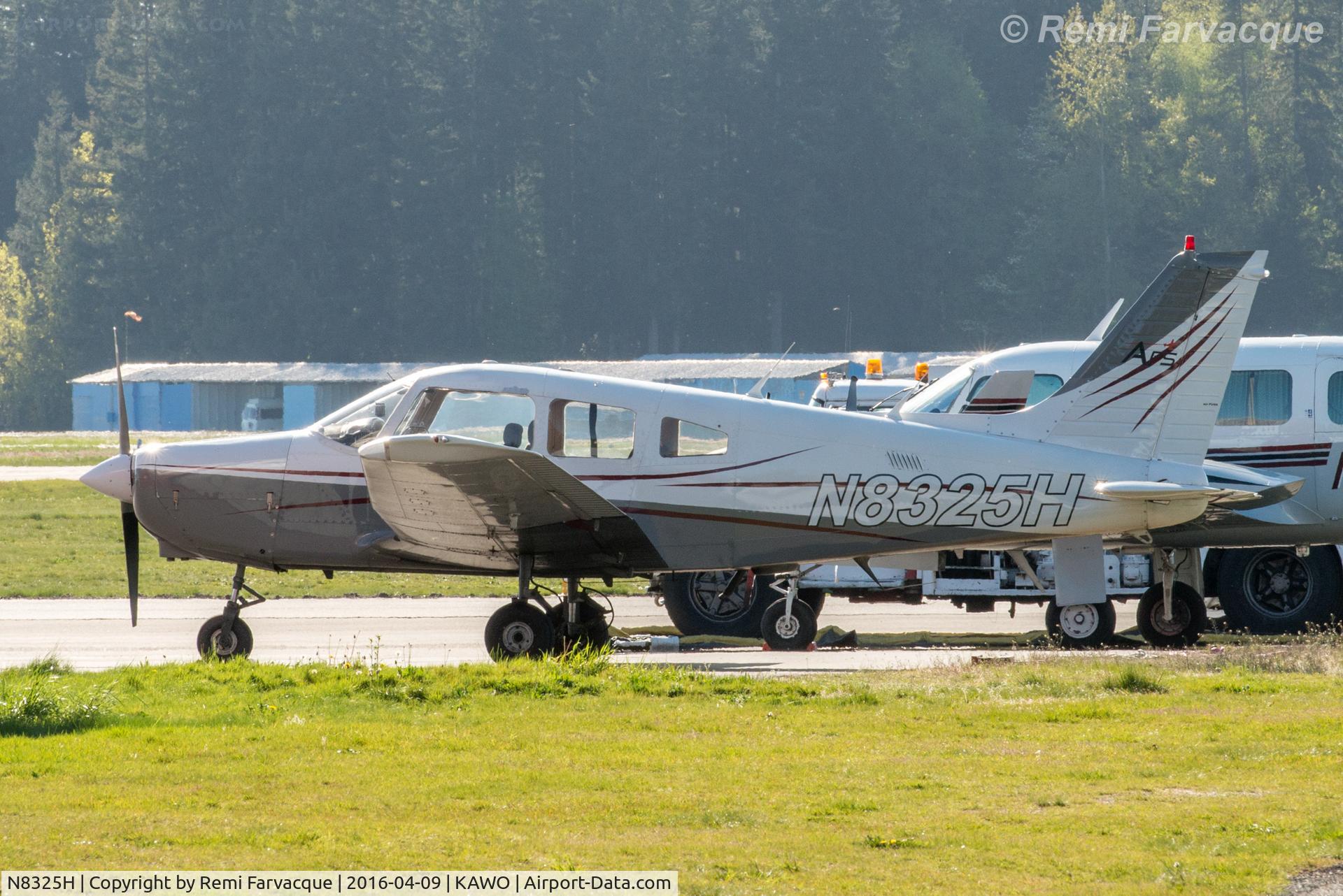 N8325H, Piper PA-28-161 C/N 28-8116130, Parked near a private hanger at north end of airport.
