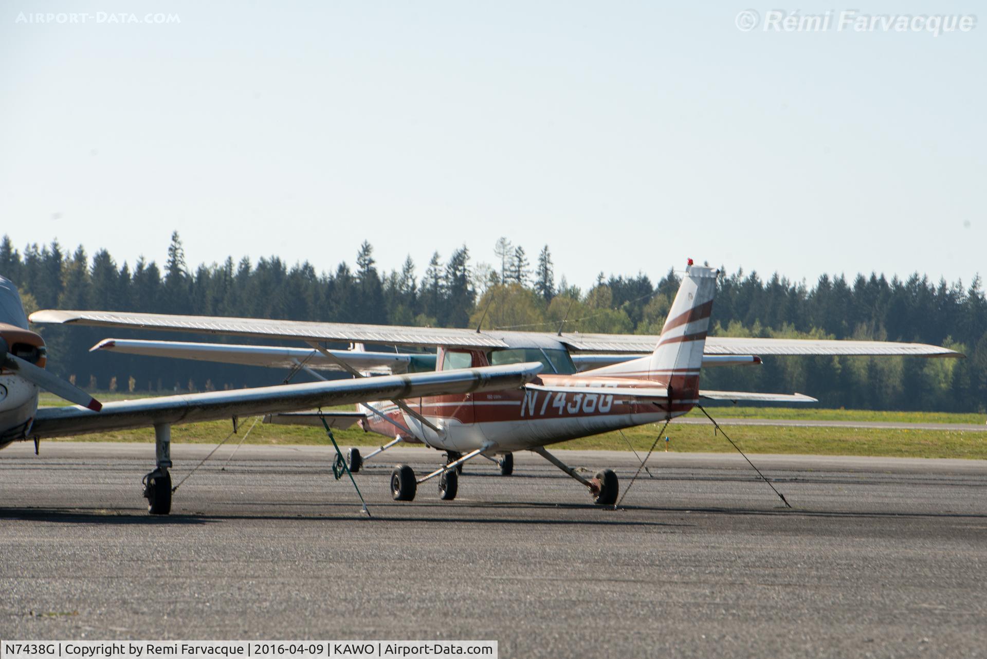 N7438G, 1973 Cessna 150L C/N 15074655, Parked southwest of main terminal building.
