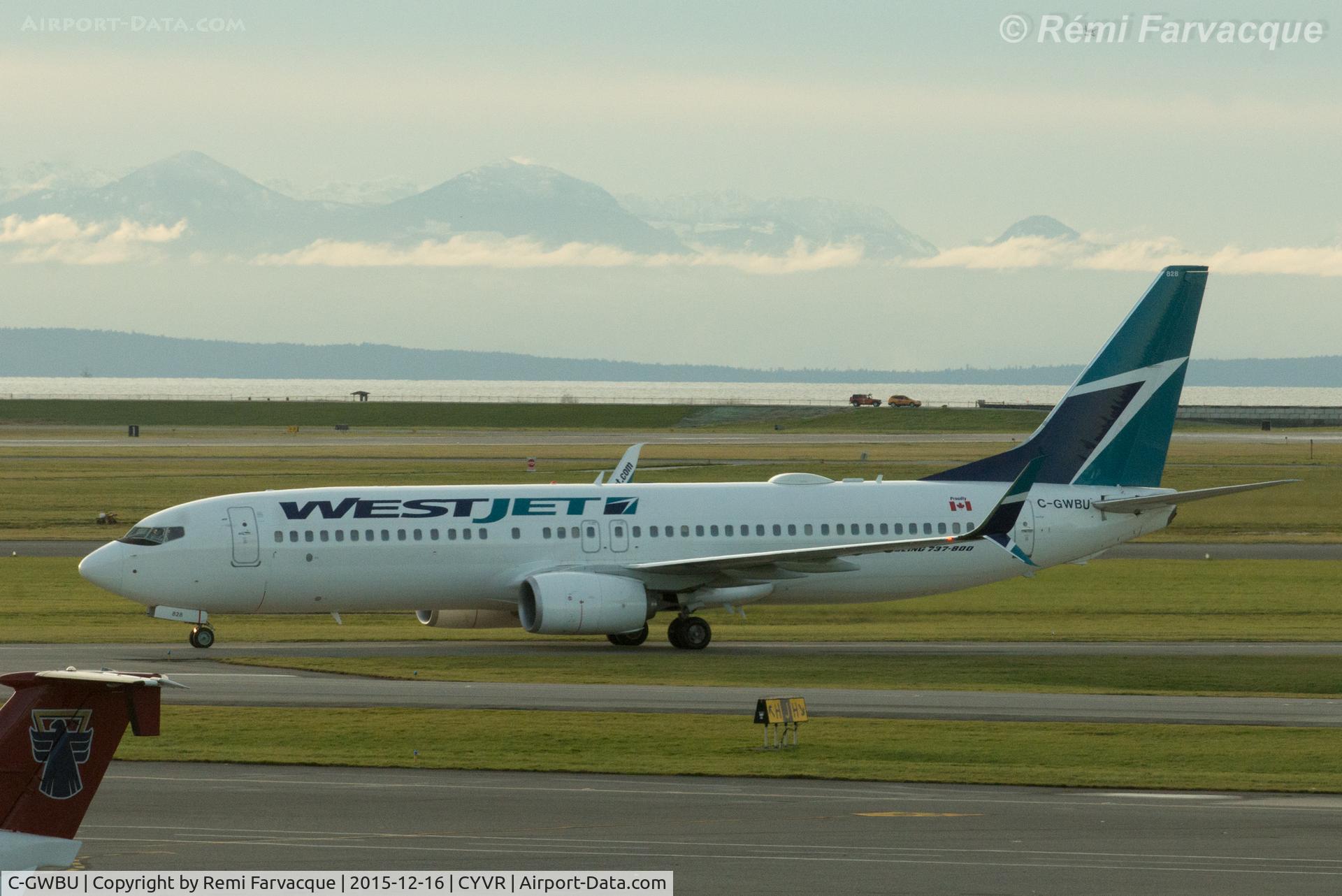 C-GWBU, 2014 Boeing 737-8CT C/N 39075, Taxiing to domestic  from north runway.