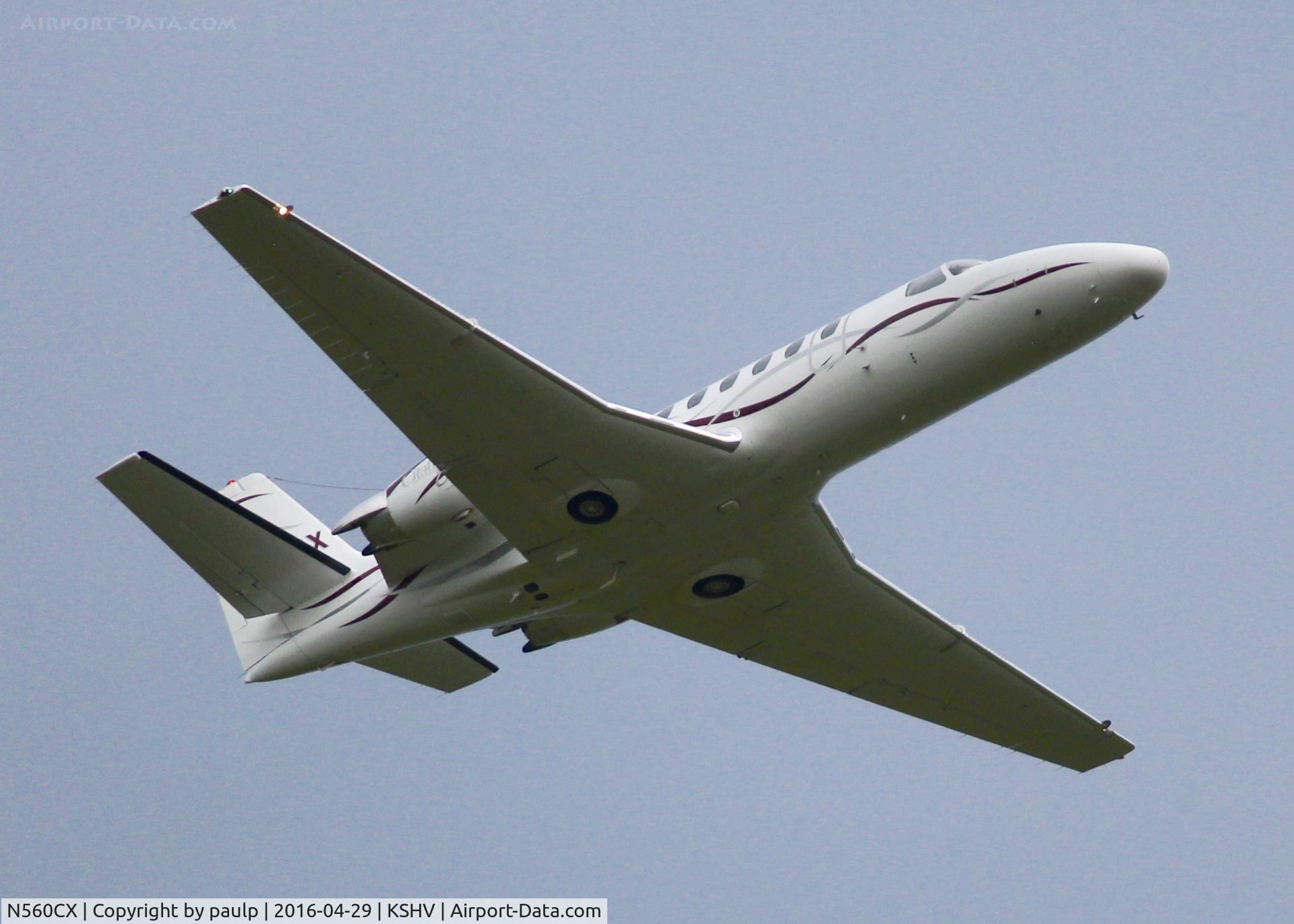 N560CX, 2001 Cessna 560 Citation Encore C/N 560-0582, At Shreveport Regional. Taking off in the pouring rain.