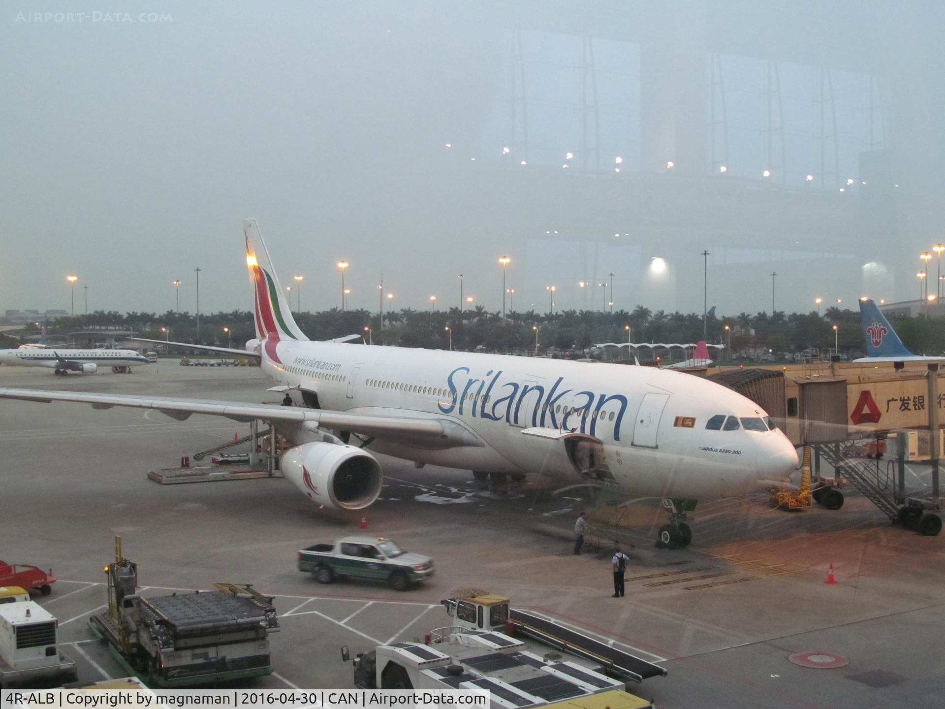 4R-ALB, 1999 Airbus A330-243 C/N 306, on apron - through glass