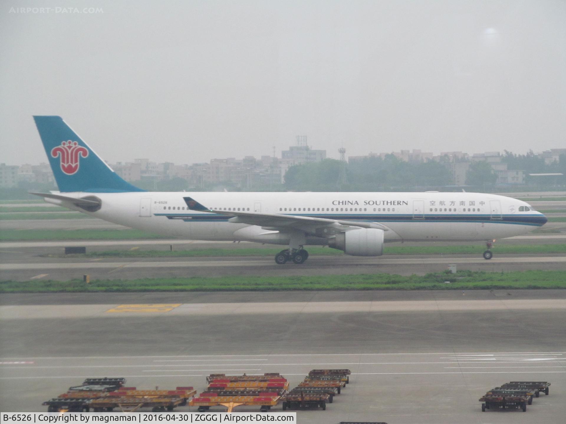 B-6526, 2011 Airbus A330-223 C/N 1220, taxying in the mist