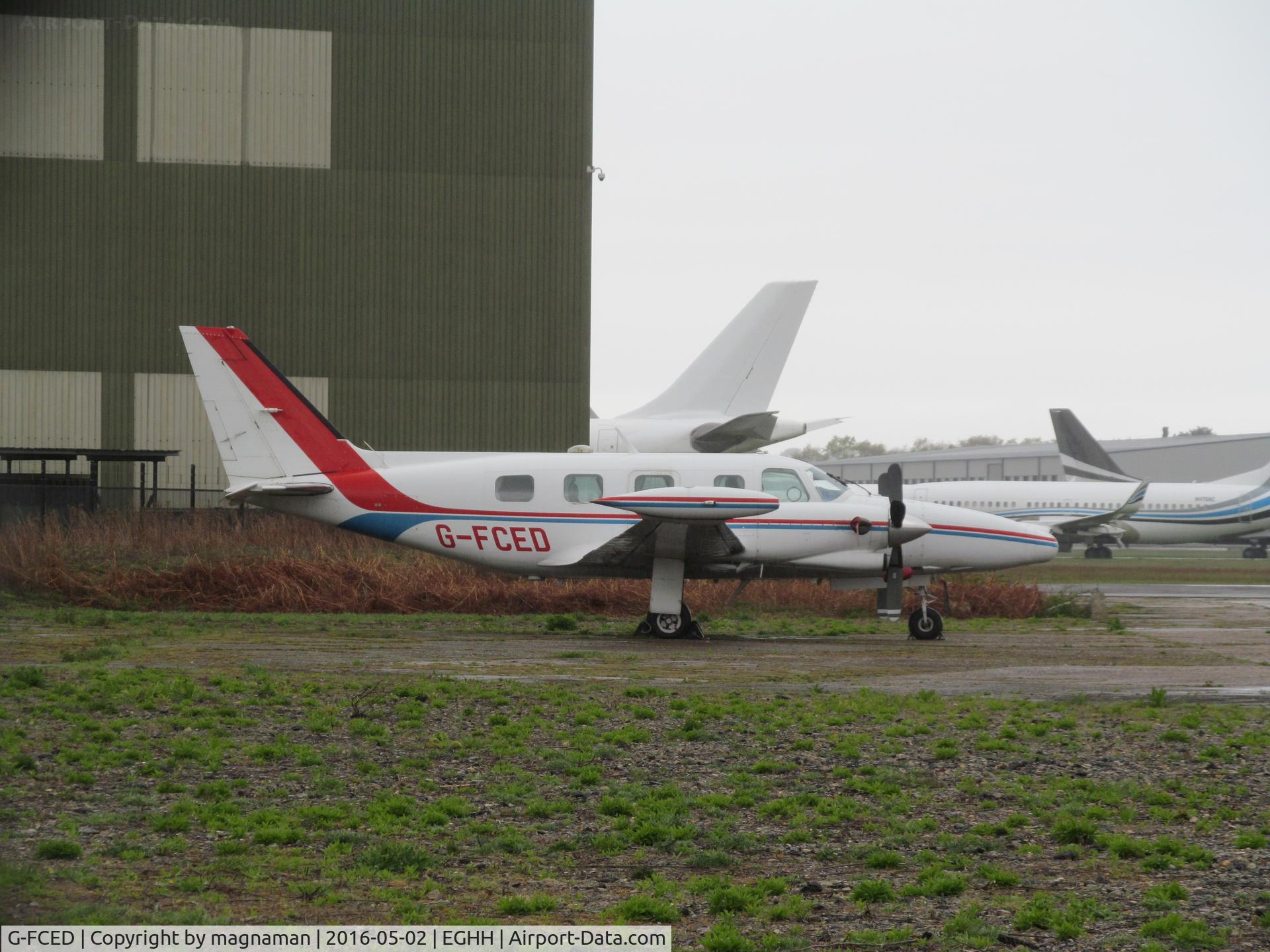 G-FCED, 1981 Piper PA-31T2-620 Cheyenne IIXL C/N 31T-8166013, nice Cheyenne at hurn - hiding behind old AIM hangar
