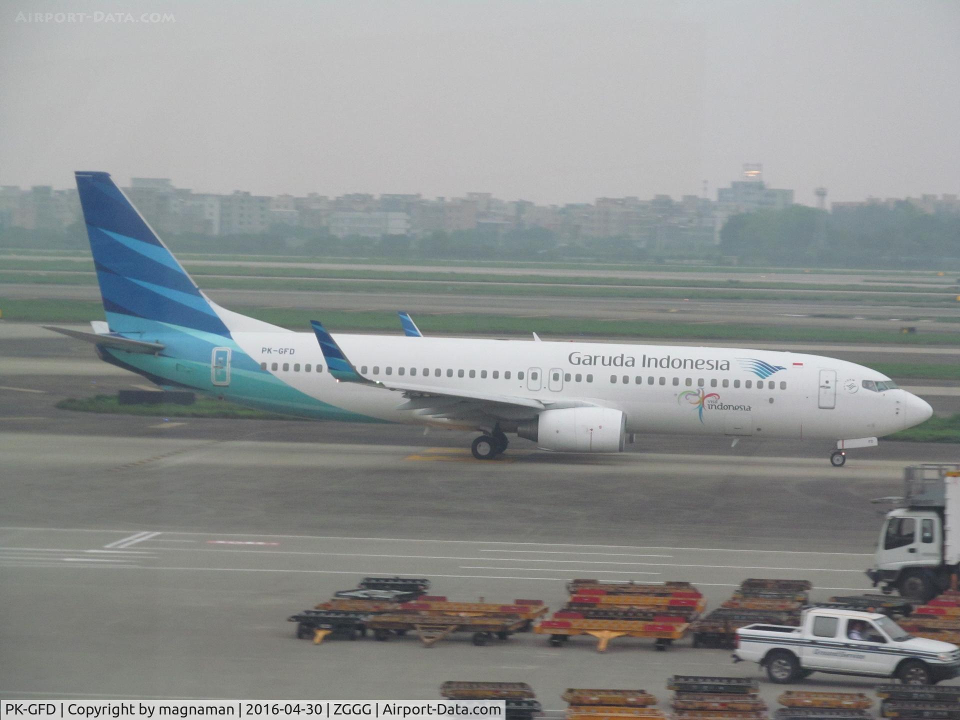 PK-GFD, 2010 Boeing 737-8U3 C/N 40807, nice 737 seen through terminal window. I last saw this in Singapore back in 2011