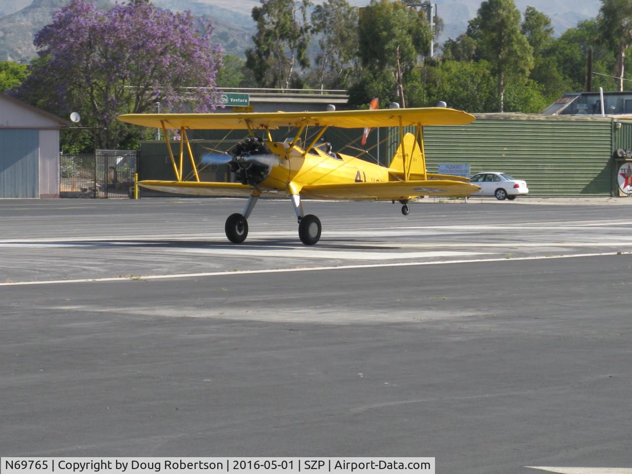 N69765, 1941 Boeing A75N1 (PT17) C/N 75-1044, 1941 Boeing Stearman A75N1 as Navy N2S-1, Continental W670 220 Hp, landing roll Rwy 22