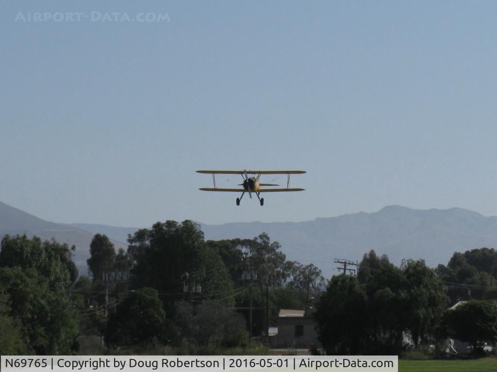 N69765, 1941 Boeing A75N1 (PT17) C/N 75-1044, 1941 Boeing Stearman A75N1 as Navy N2S-1, Continental W670 220 Hp, on final Rwy 22