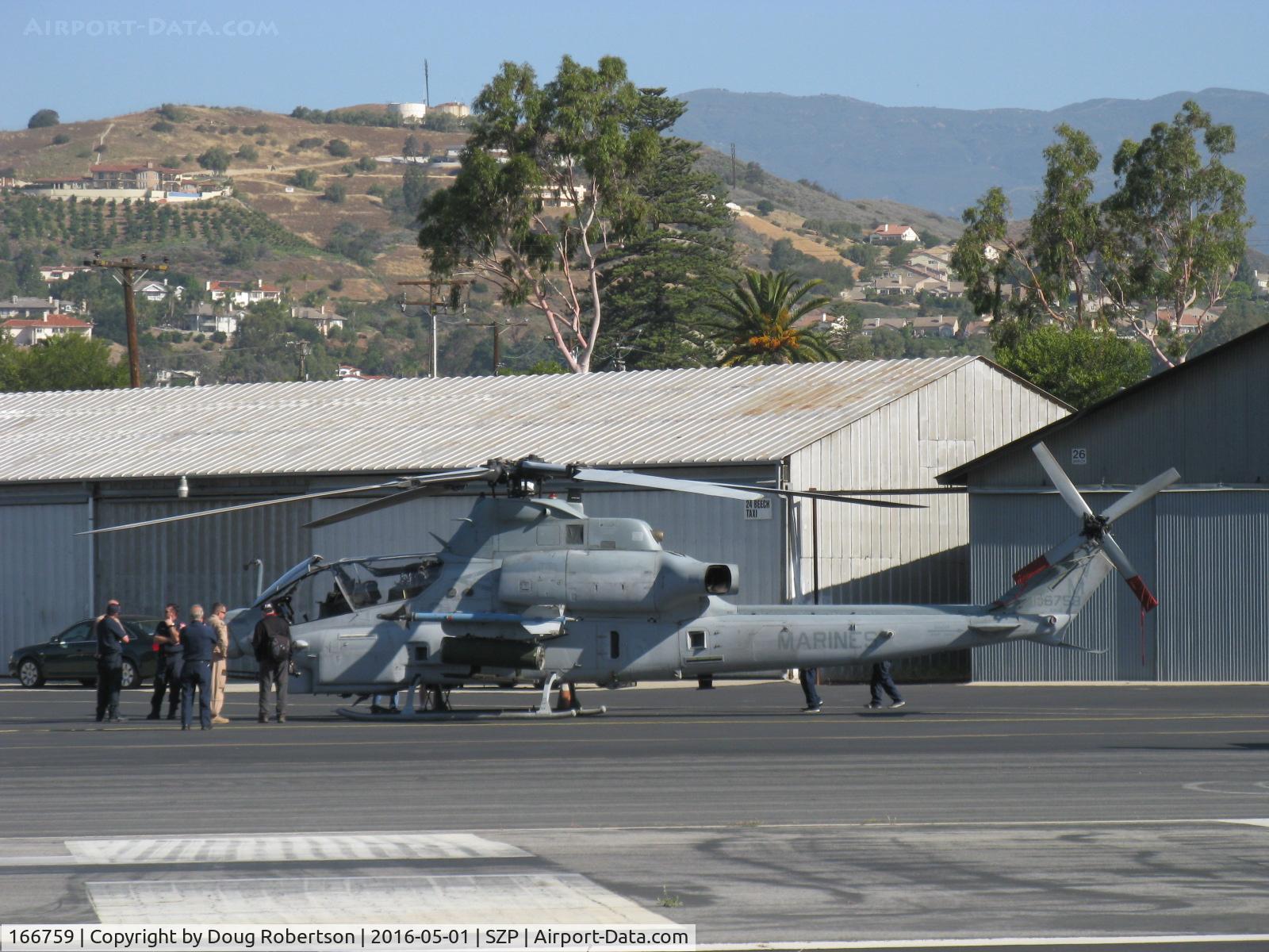 166759, 2005 Bell AH-1Z Viper C/N Not found 166759, Bell Textron AH-1Z COBRA/VIPER, two General Electric T700-GE-401C/C turboshaft rated 1,800 shp each, adjacent ex-Marine Doug Pendleton's cleared hangar for USMC Recruiting today. 166759 was first production AH-1Z delivered 25 Jan. 2007. See SZP photo.