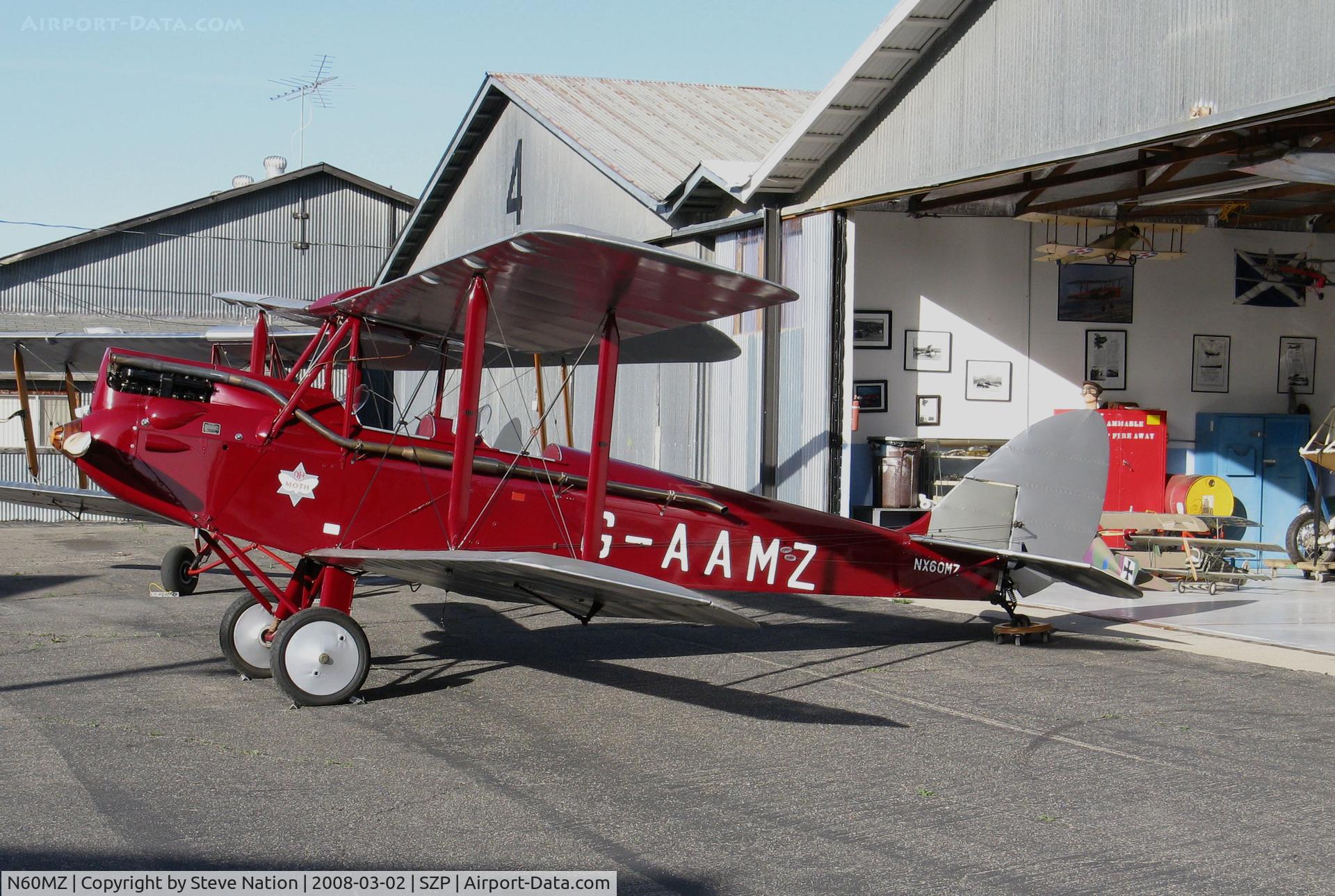 N60MZ, 1930 De Havilland DH-60G Gypsy Moth C/N 1293, ocally-based 1930 deHavilland DH-60G Gypsy Moth in red color scheme and carrying U.S. and British registrations (NX60MZ and G-AAMZ) @ Santa Paula Airport, CA