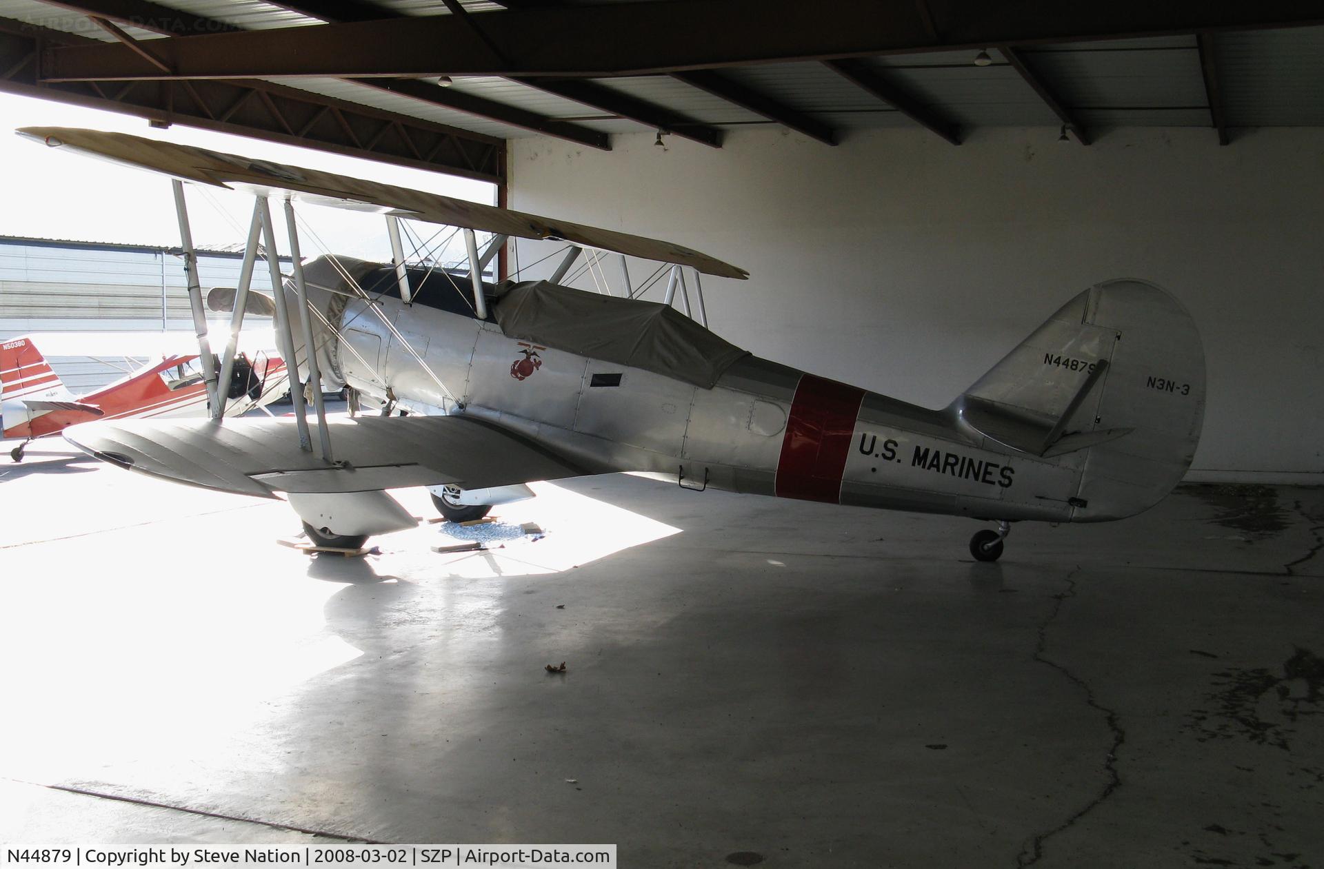 N44879, 1940 Naval Aircraft Factory N3N-3 C/N 4425, Locally-based 1940 Naval Aircraft Factory N3N-3 Yellow Peril in US Marines paint scheme with cockpit cover @ Santa Paula Airport, CA