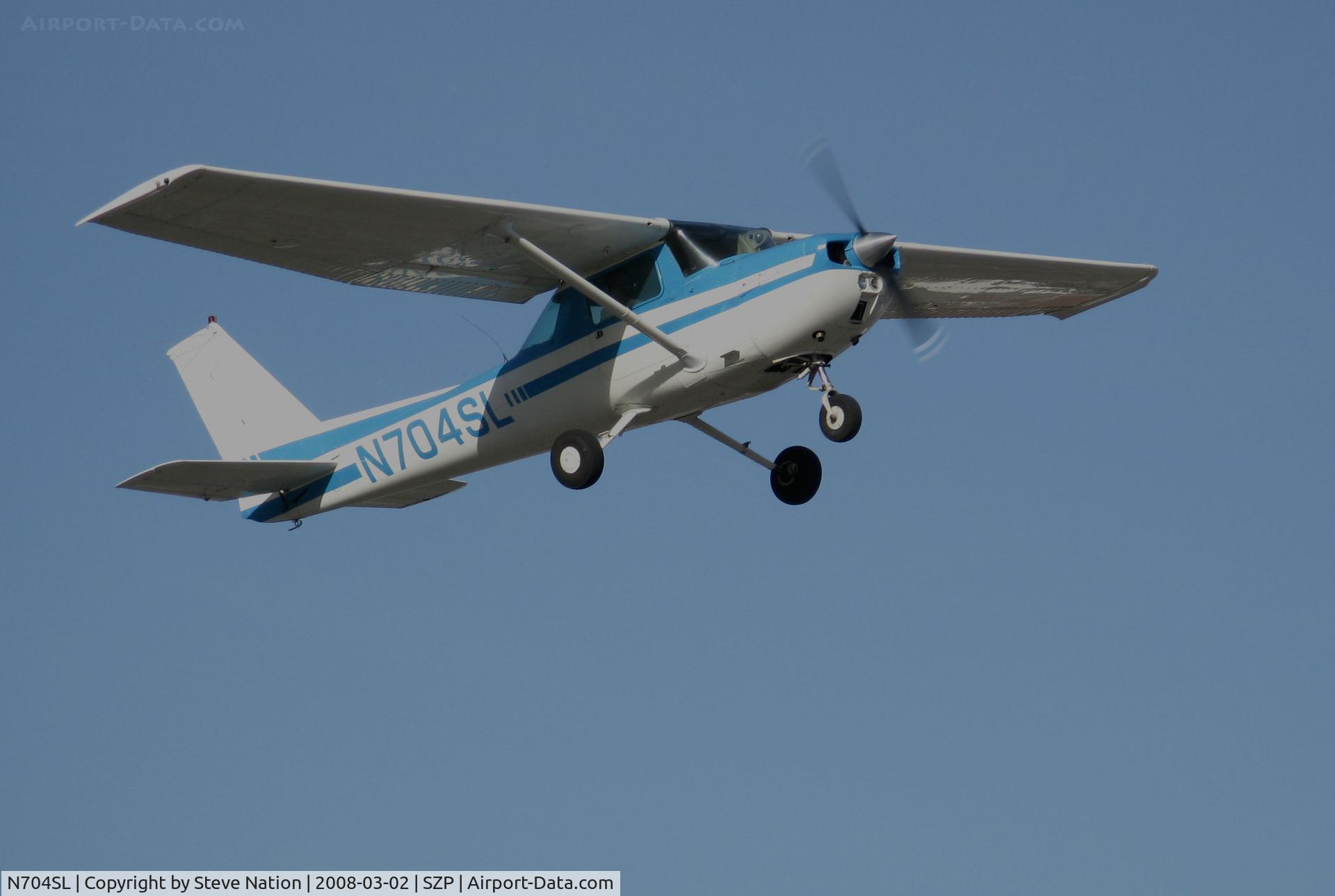 N704SL, 1976 Cessna 150M C/N 15078837, Locally-based 1976 Cessna 150M climbing out @ Santa Paula Airport, CA