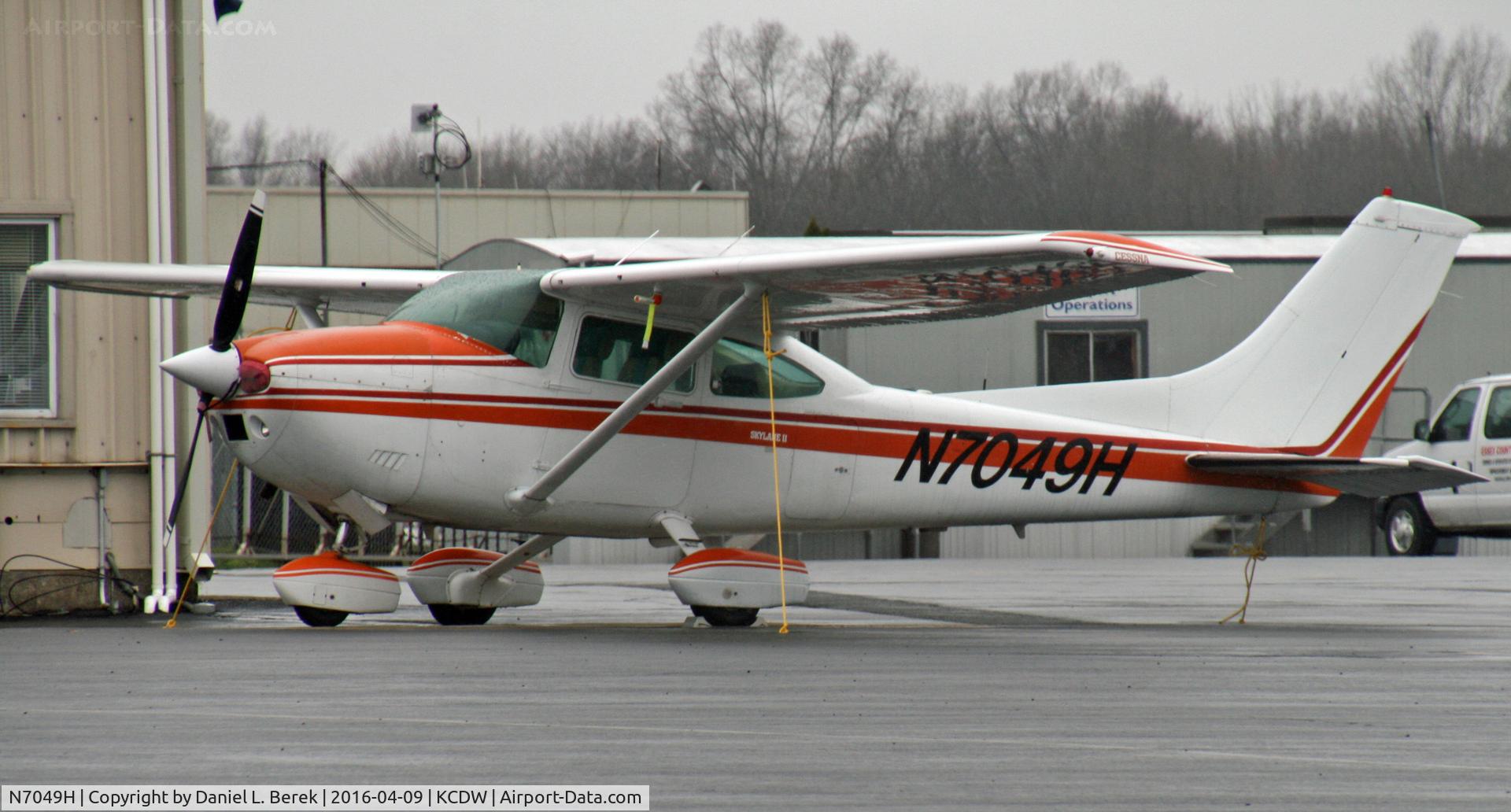 N7049H, 1981 Cessna 182R Skylane C/N 18267900, 1981-build Skylane on a rainy day at Essex County Airport.