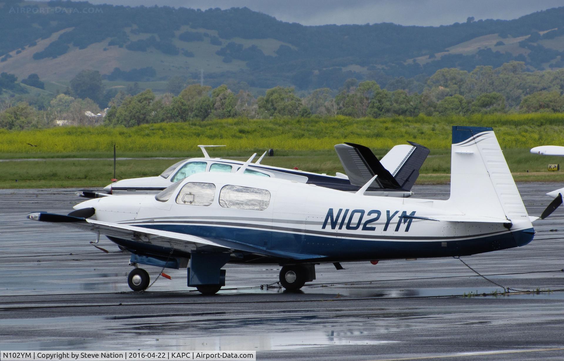 N102YM, 1996 Mooney M20J 201 C/N 24-3389, Eagle, ID-based 1996 Mooney M20J in new color scheme after spring showers @ Napa County Airport, CA