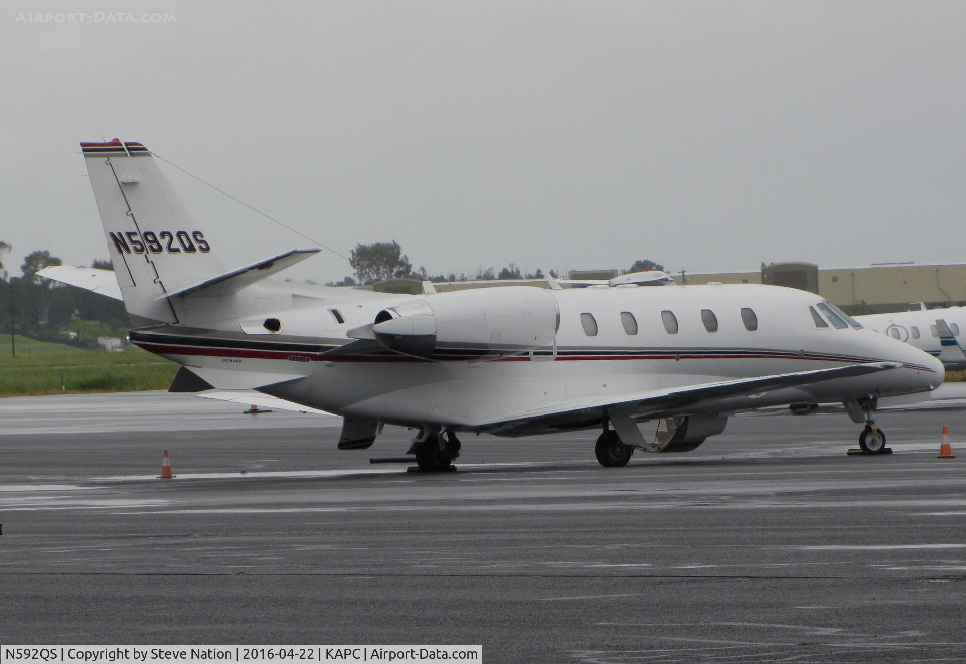 N592QS, 2007 Cessna 560XL Citation XLS C/N 560-5706, Netjets 2007 Cessna 560XL Citation Excel on rainy ramp @ Napa County Airport, CA