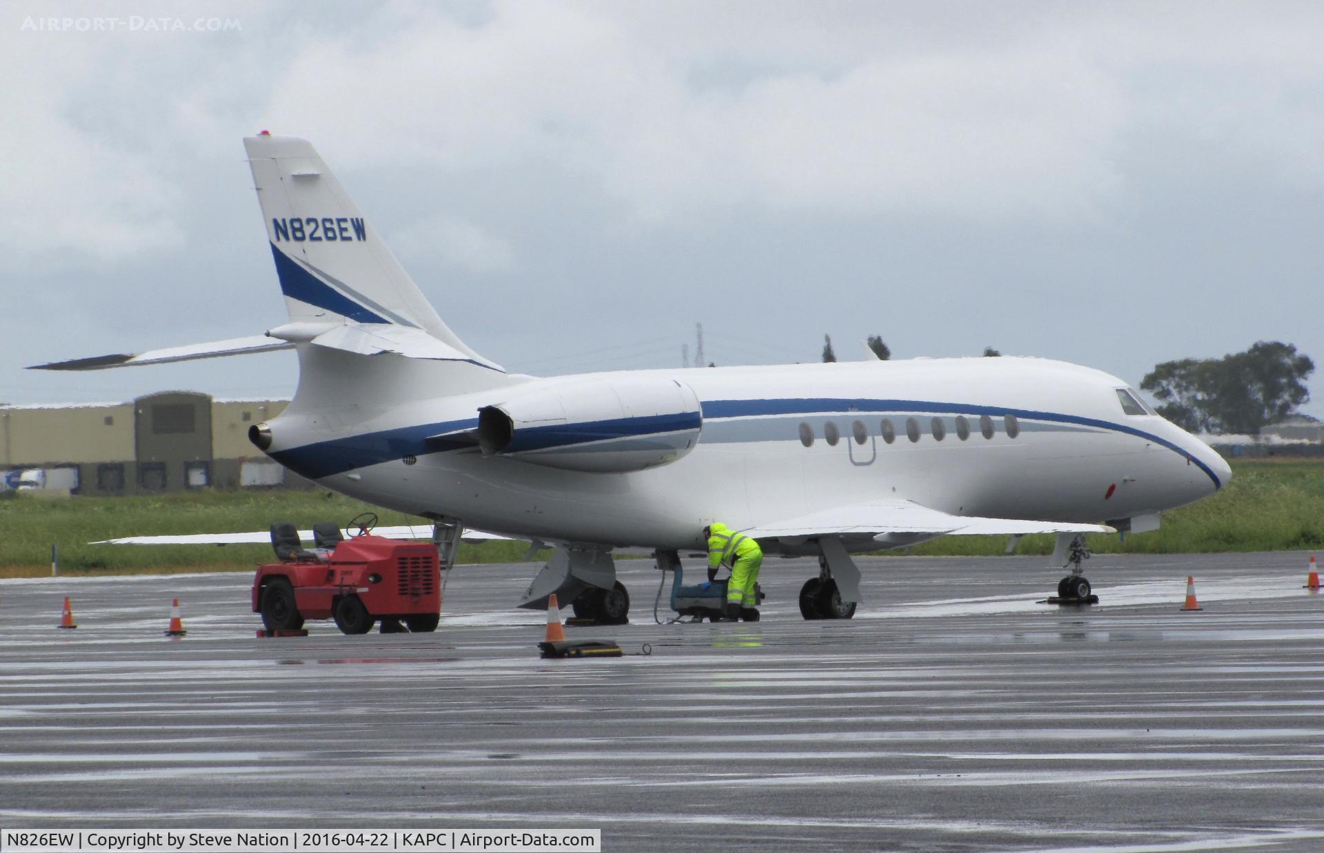 N826EW, 1998 Dassault Falcon 2000 C/N 58, Vesey Air LLC (Danbury, CT) 1998 Dassault Falcon 2000 on the ramp in the rain @ Napa County Airport, CA - someone has to fill the honey bucket!