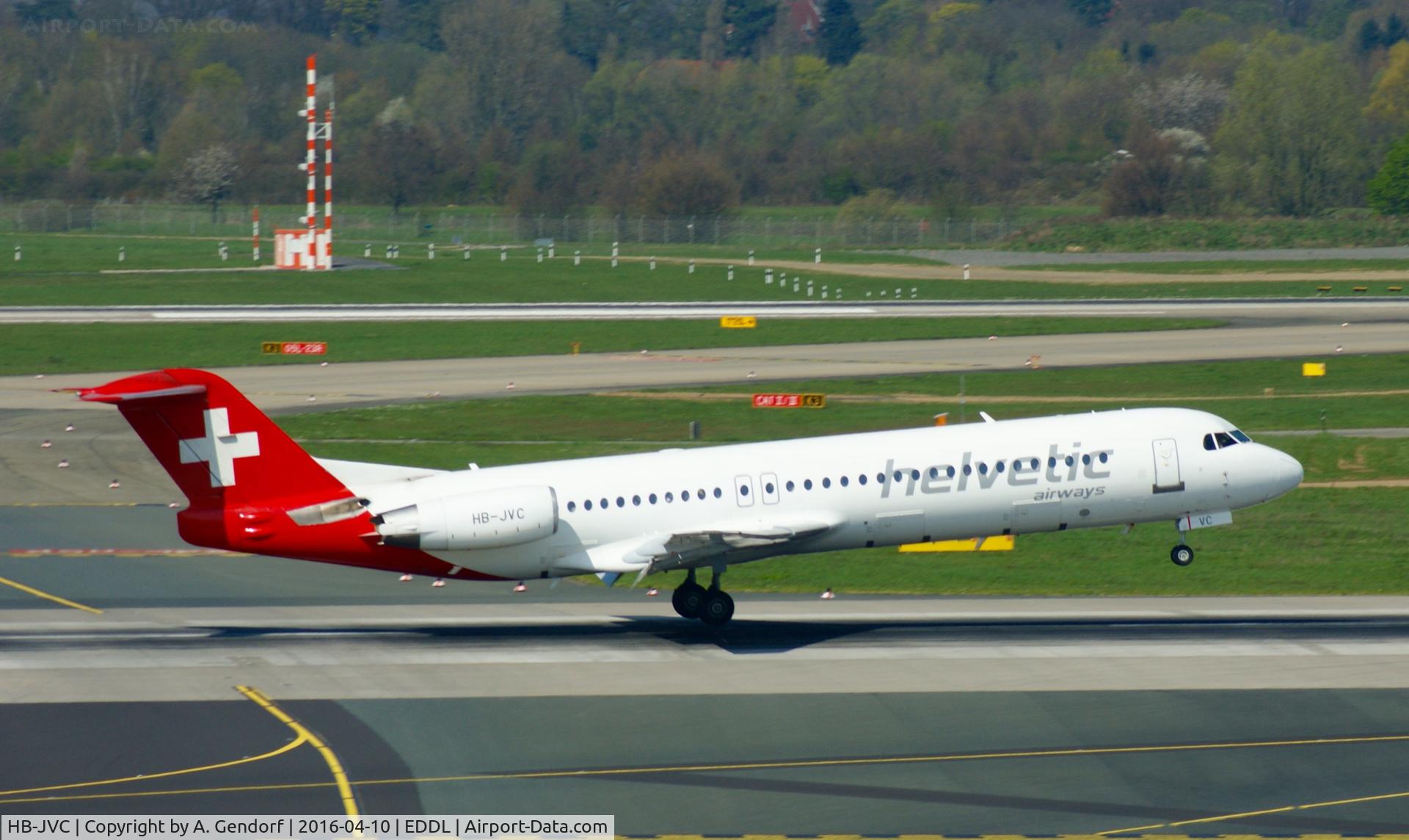 HB-JVC, 1994 Fokker 100 (F-28-0100) C/N 11501, Helvetic, is just touching ground at Düsseldorf Int'l(EDDL)
