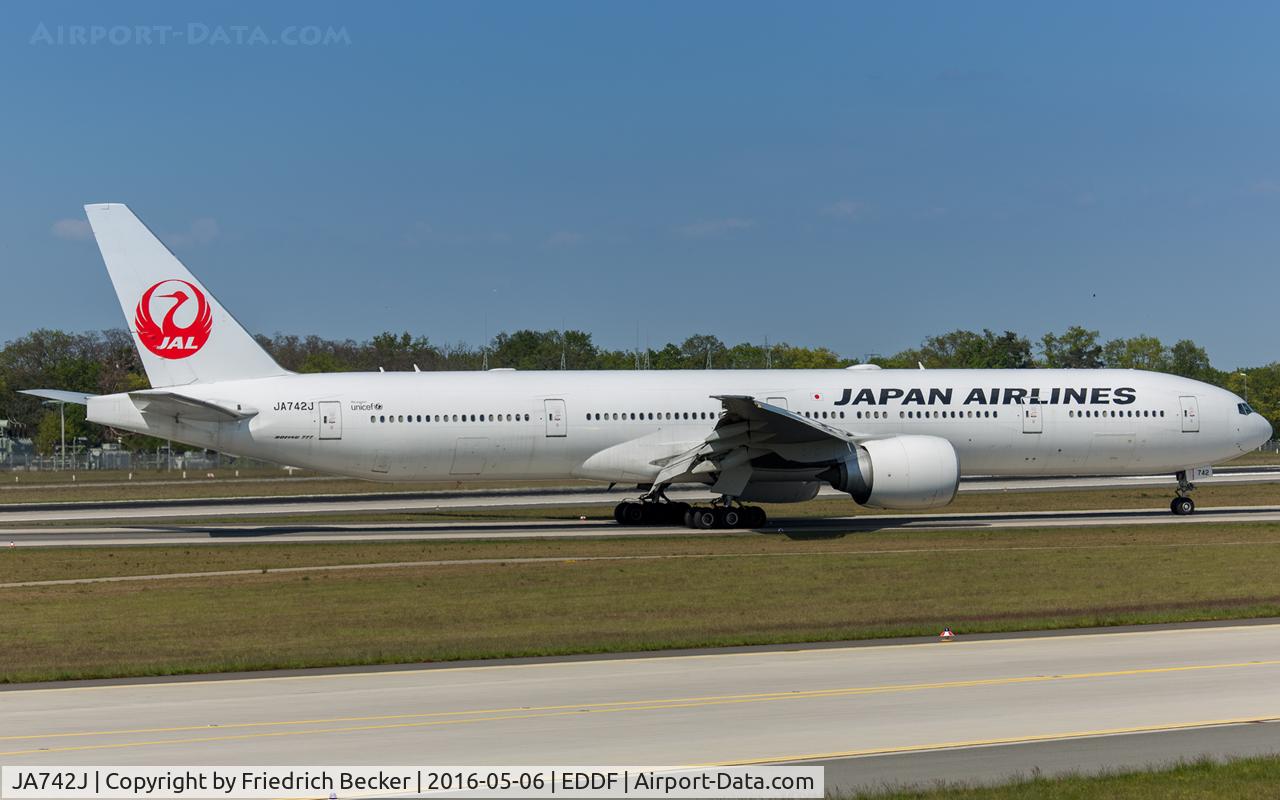 JA742J, 2009 Boeing 777-346/ER C/N 36129, vacating the runway