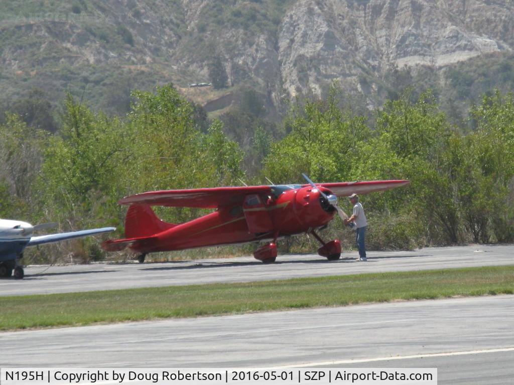 N195H, 1948 Cessna 195 Businessliner C/N 7200, 1948 Cessna 195, Jacobs R-755-A2 300 Hp radial, pulling the prop through rotations prior to engine start. Always do this before starting a radial engine.