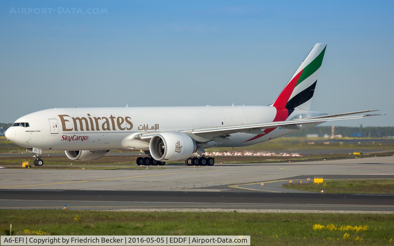 A6-EFI, 2012 Boeing 777-F1H C/N 35609, taxying to the holding prior departure via RW18W