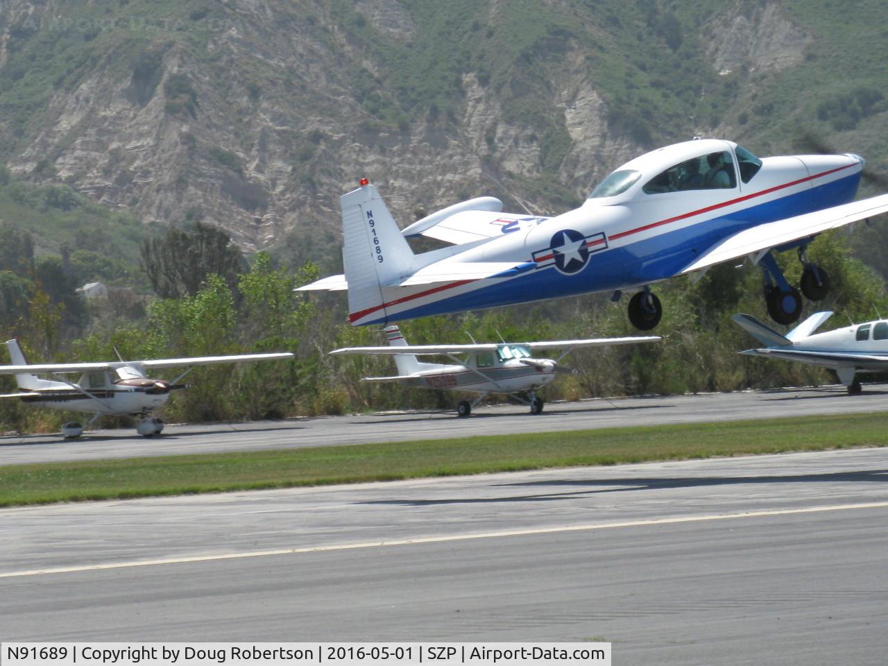 N91689, 1946 North American Navion (NA-145) C/N NAV-4-431, 1946 North American NAVION, Continental E225 Upgrade, takeoff climb Rwy 22, Young Eagles flight-with apologies my bad panning