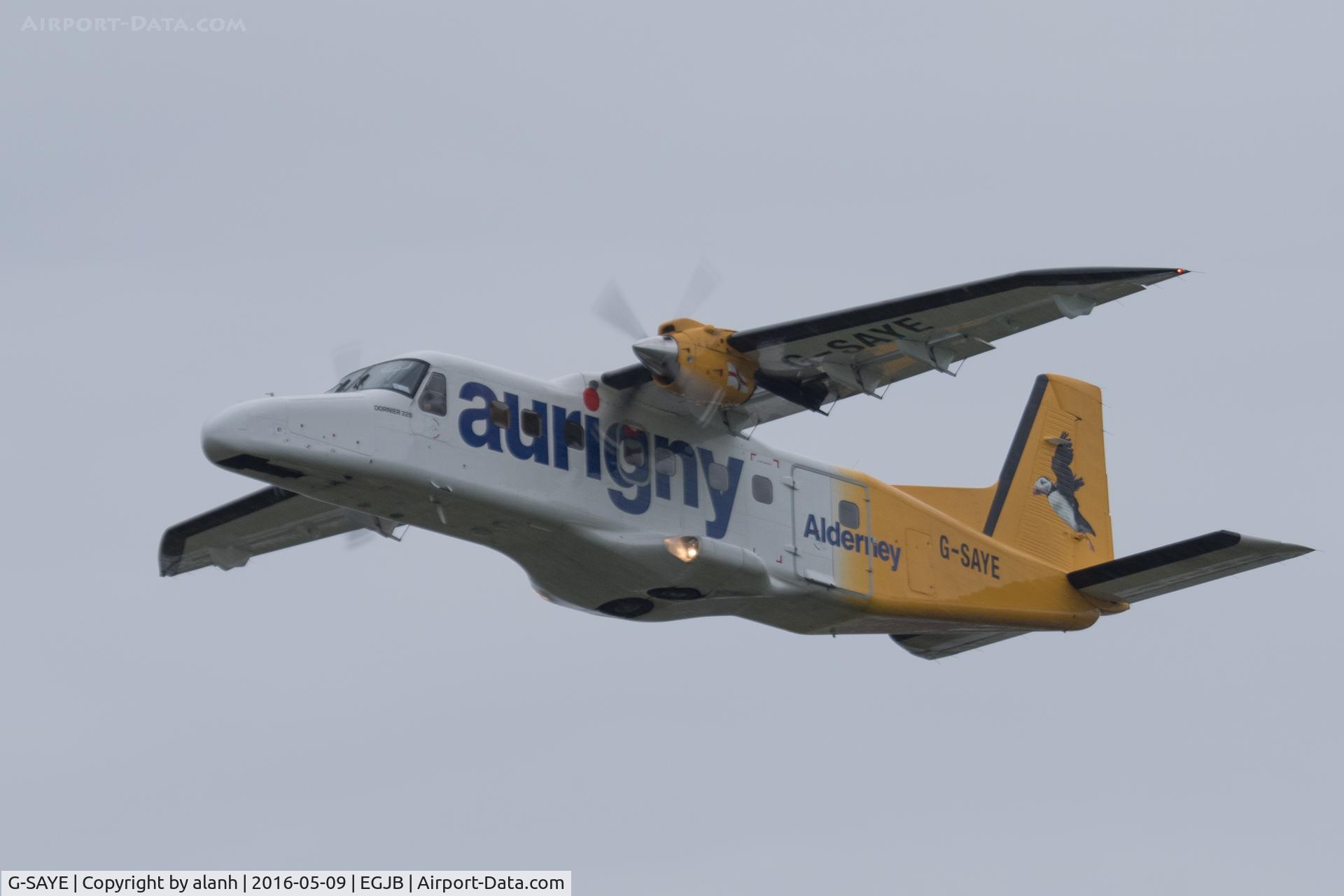 G-SAYE, 1984 Dornier 228-202K C/N 8046, Departing Guernsey for Alderney on a grey and wet Liberation Day (local holiday)