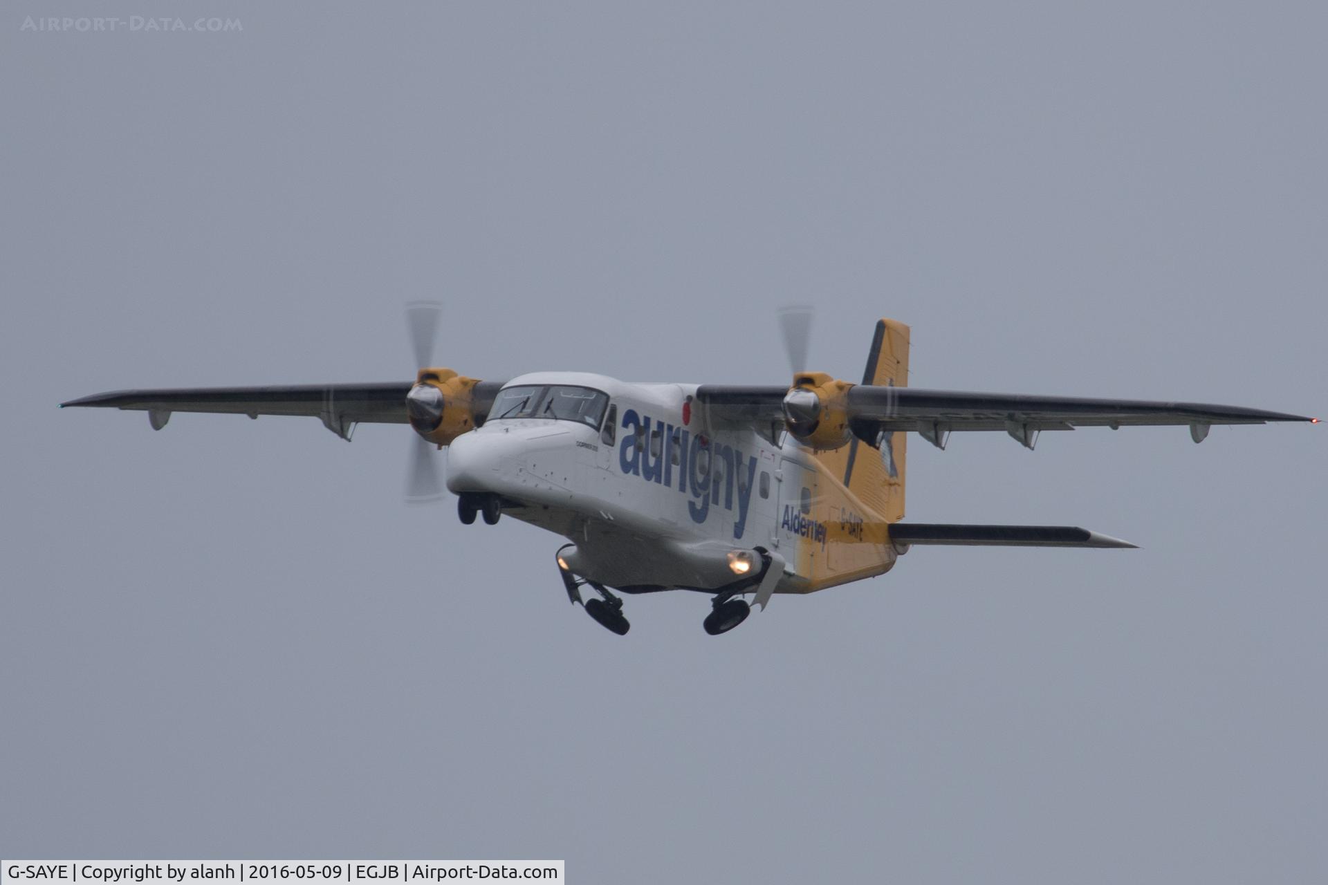 G-SAYE, 1984 Dornier 228-202K C/N 8046, Departing Guernsey for Alderney on a grey and wet Liberation Day (local holiday)