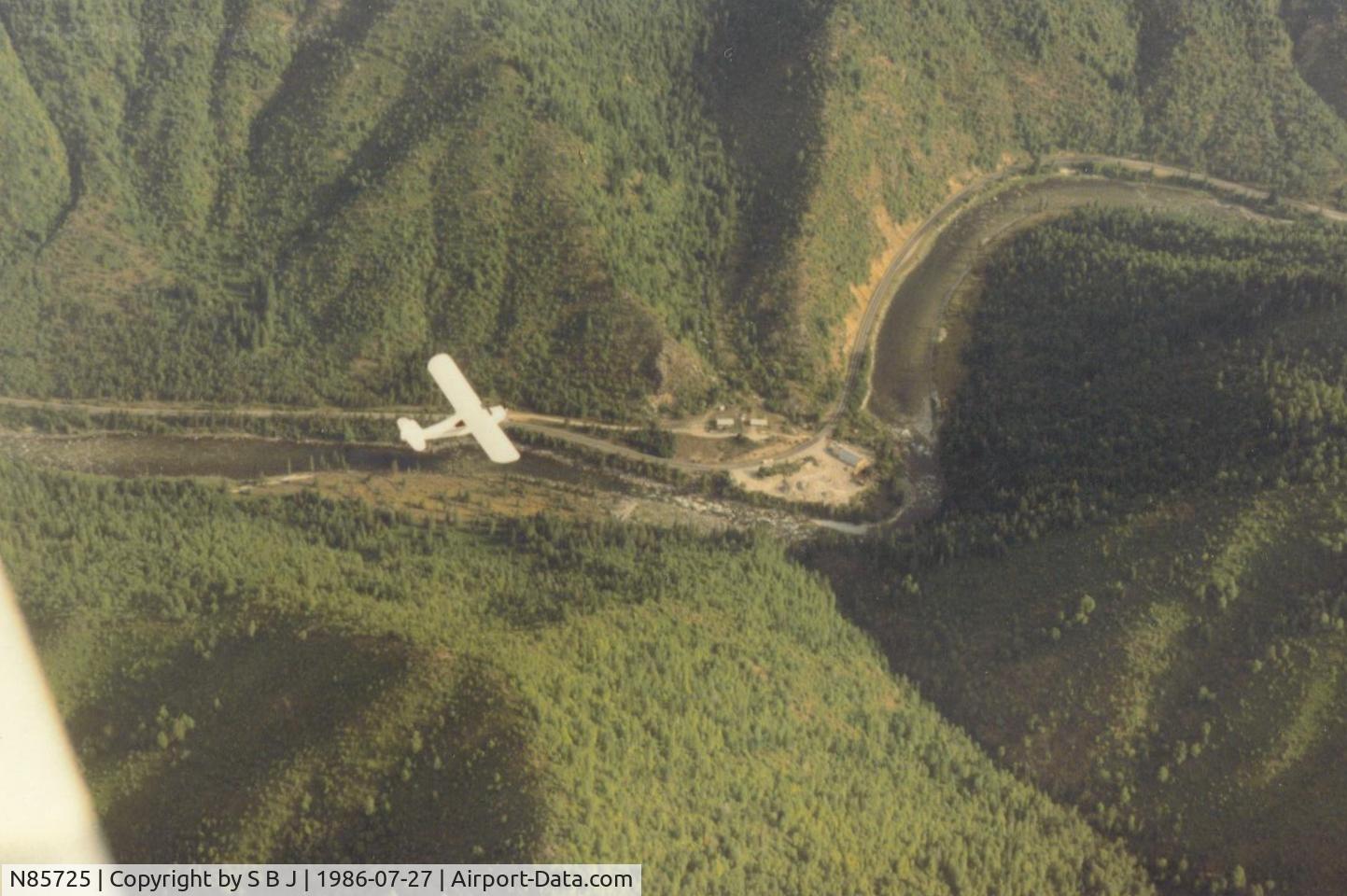 N85725, 1946 Aeronca 7BCM C/N 7AC-4472, 725 flying over the Lochsa river toward Lolo Pass and to Kalispell,Mt. This is in the Bitteroot mt range in Idaho. Motor always sounds a little different when flying over terrain like this.