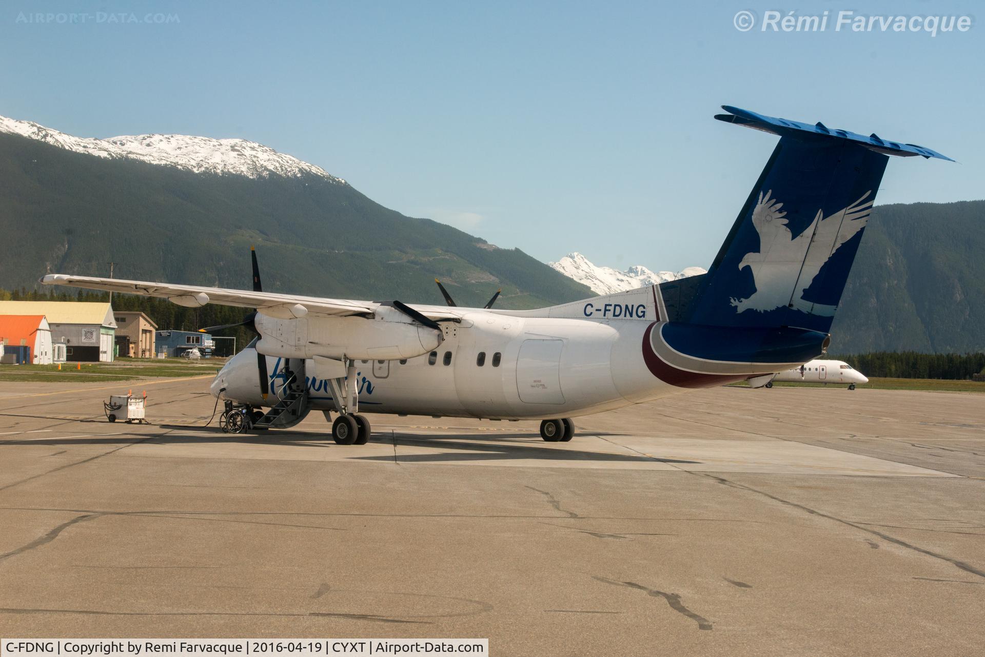 C-FDNG, 1989 De Havilland Canada DHC-8-102 Dash 8 C/N 166, Parked at main terminal.