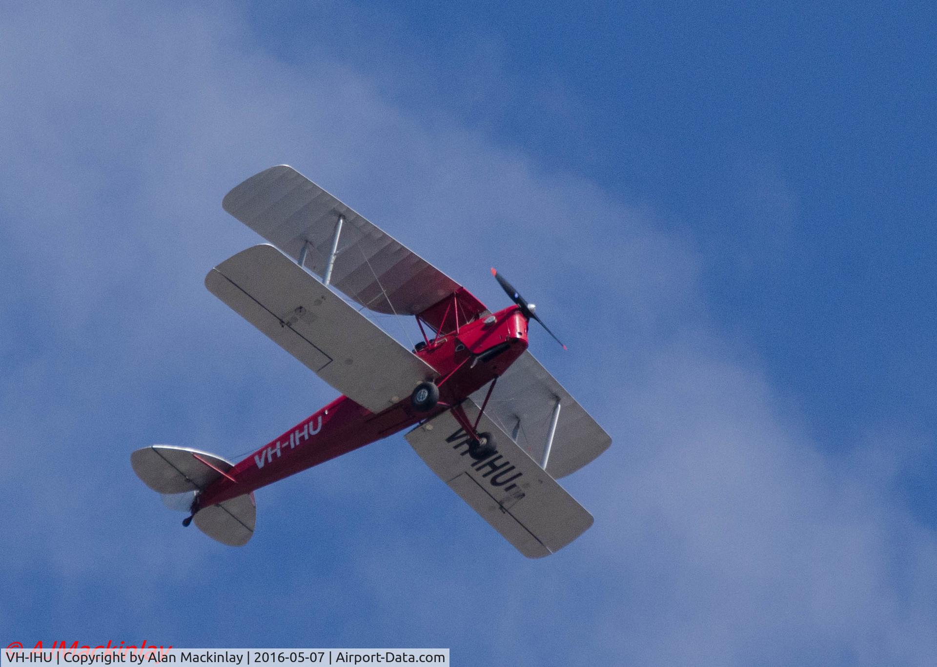 VH-IHU, 1942 De Havilland Australia DH-82A Tiger Moth C/N DHA434, Watching rugby near Orrong Rd/Malvern Rd corner in Melbourne and took photo with Nikon D7000 Sigma 120-400mm Tele lens at 400mm