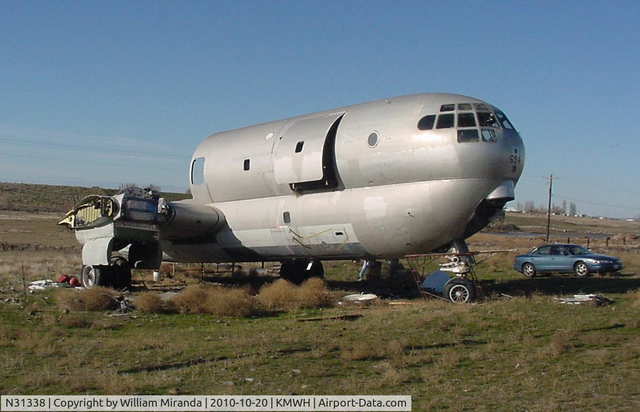 N31338, 1954 Boeing KC-97G C/N 52-2694, Taken @ October 2010. Ex USAF 52-2694. Salvaged a lot of parts out of it with the owner being paid. When to FL shortly after and called the owner about buying the top half of the fuselage but was told it was scrapped.
