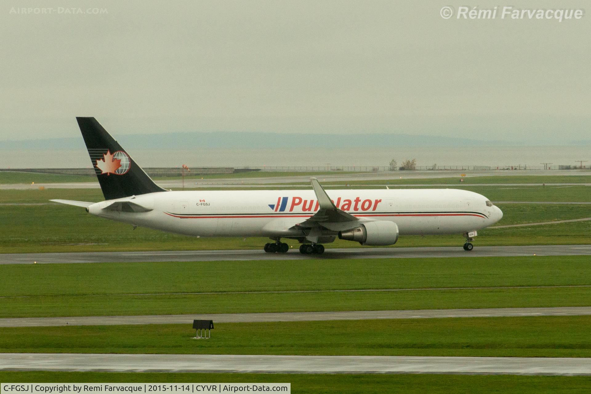 C-FGSJ, 1993 Boeing 767-39H C/N 26256, Taxiing for easterly take-off on south runway.