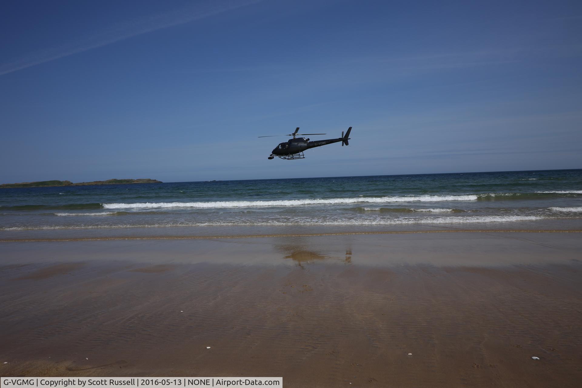 G-VGMG, 1992 Eurocopter AS-350B-2 Ecureuil Ecureuil C/N 2668, NW200 fly by on the beach